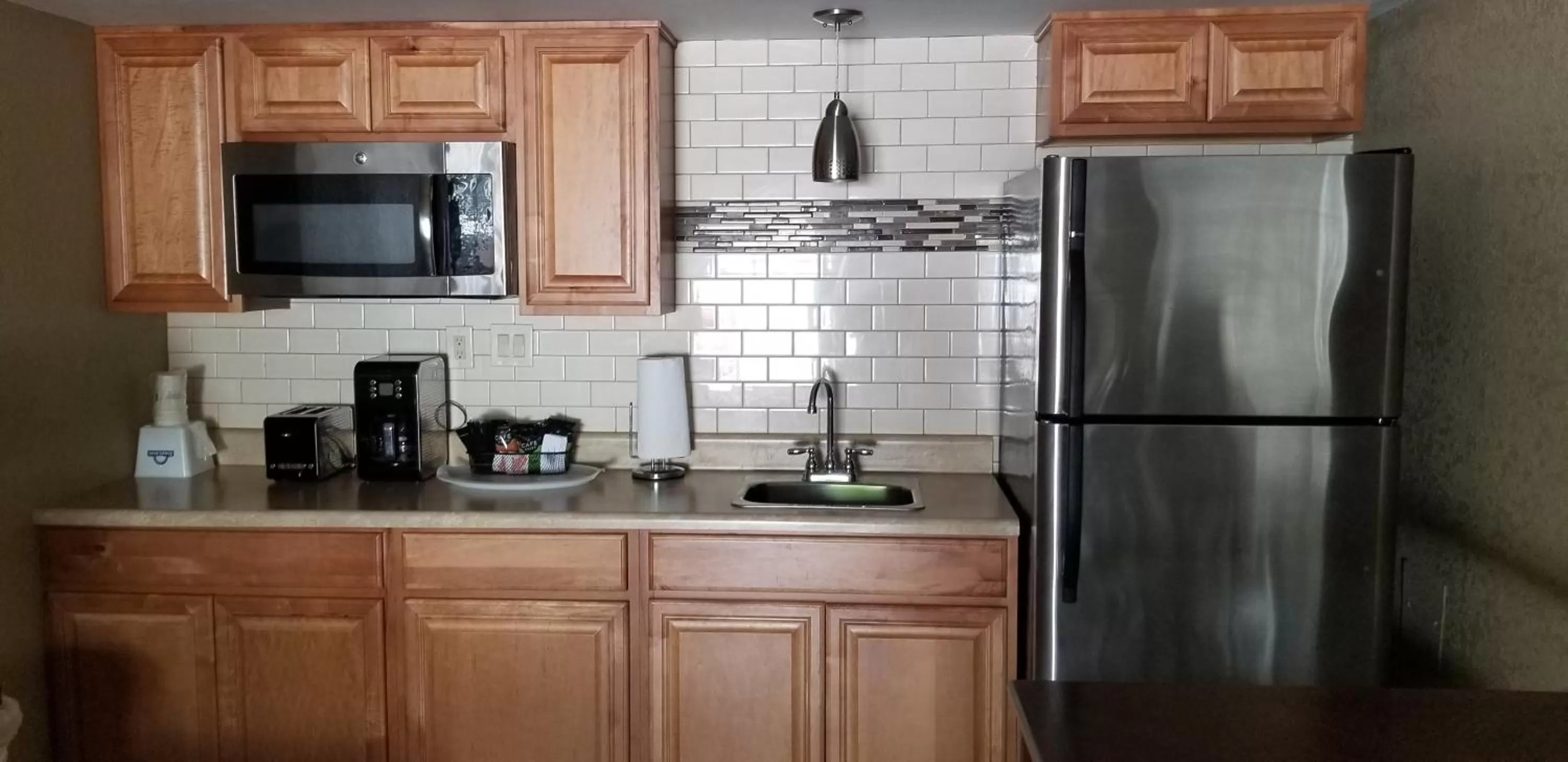 Kitchen or kitchenette in Days Inn by Wyndham Cocoa Cruiseport West At I-95/524