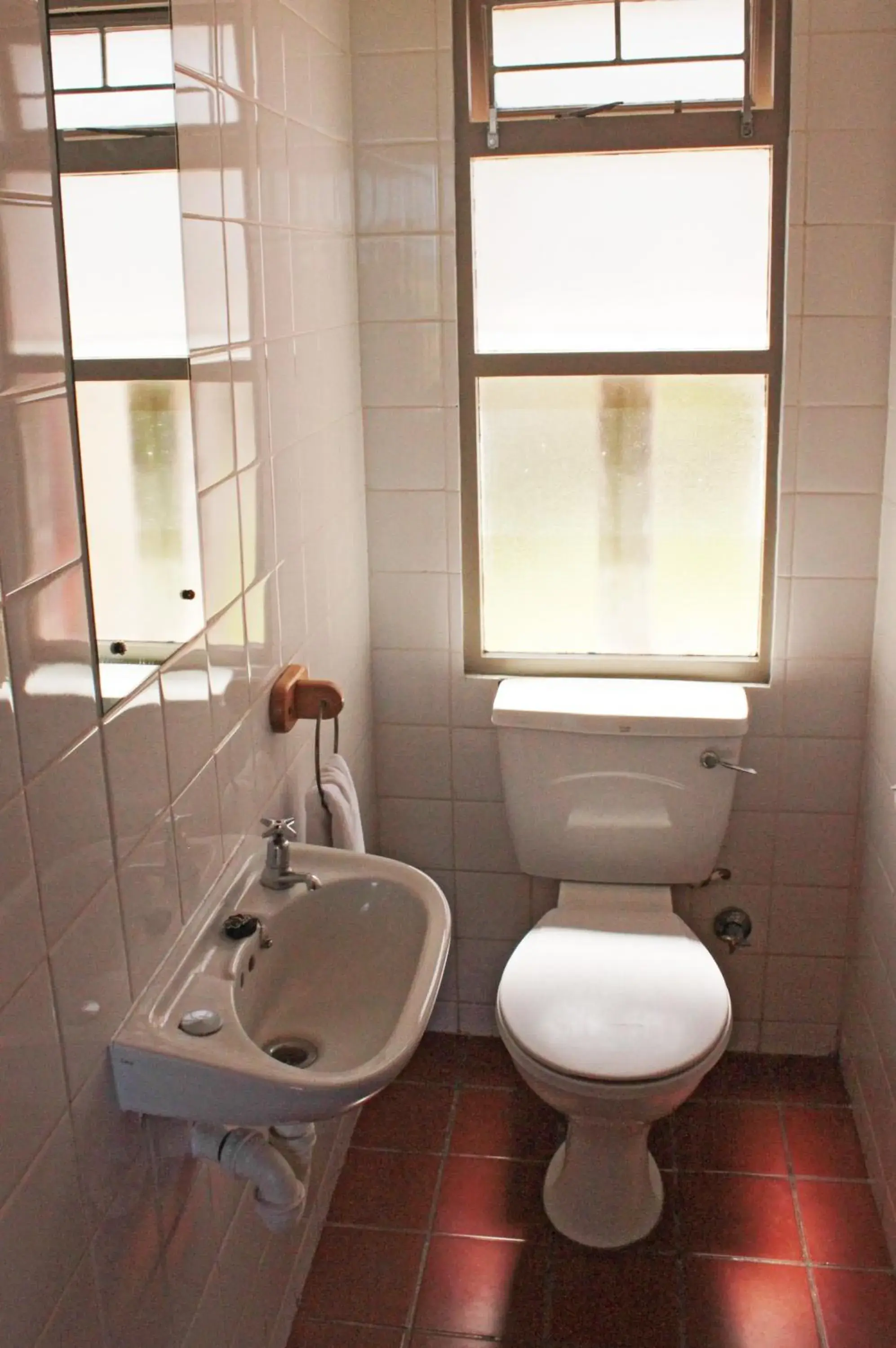 Toilet, Bathroom in Blue Bay Lodge