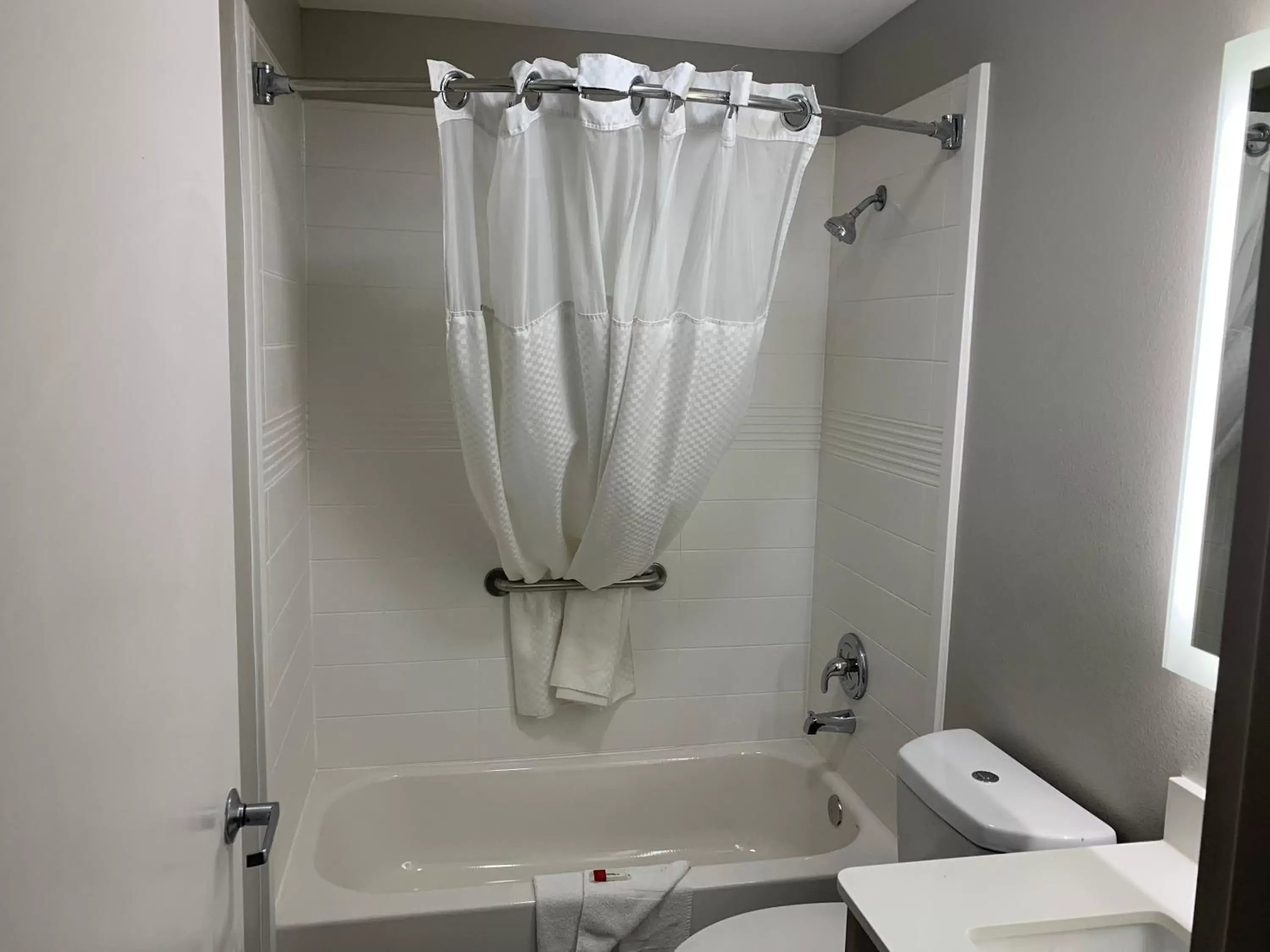 Bathroom in Microtel Inn by Wyndham Charlotte Airport