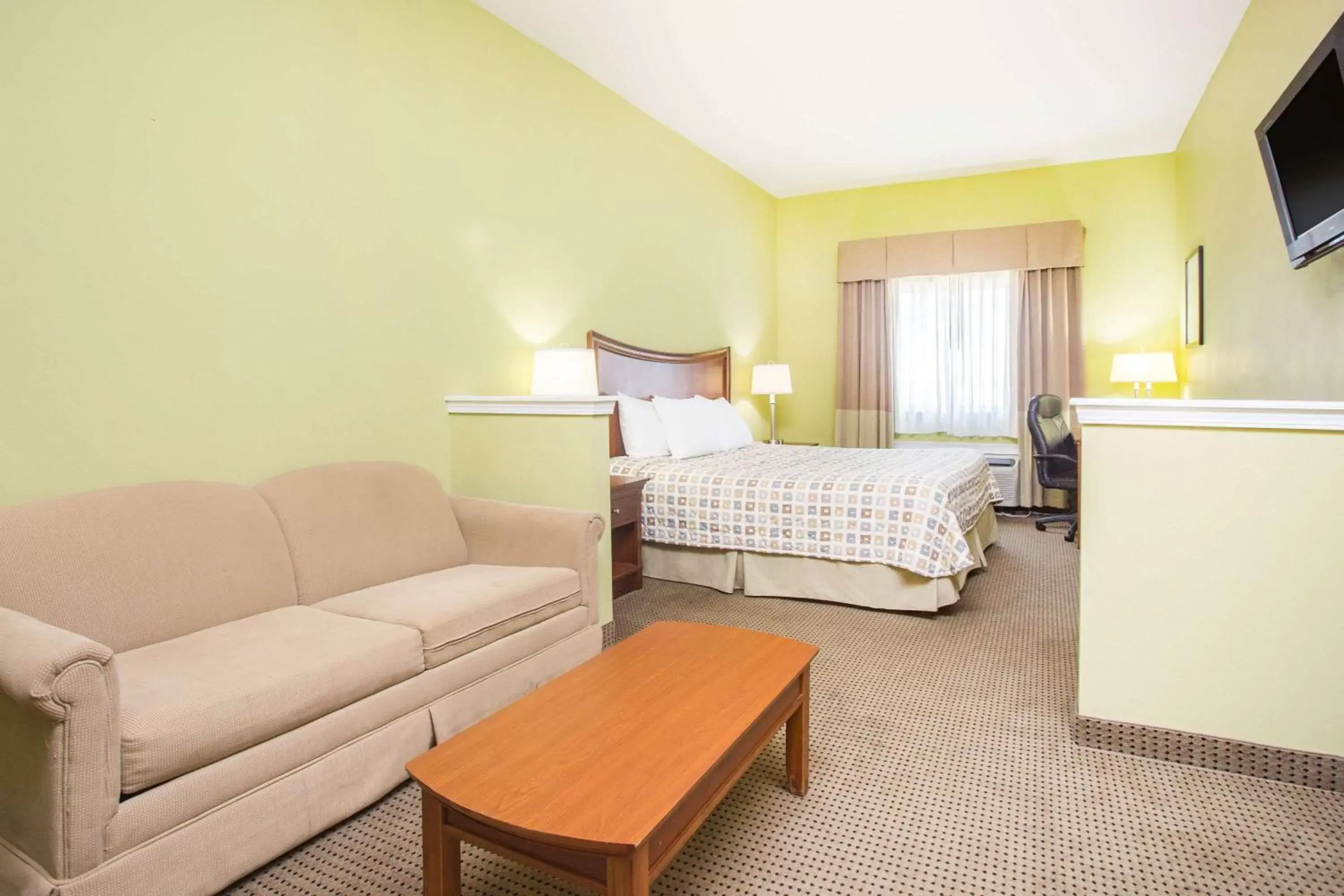 Photo of the whole room in Days Inn & Suites by Wyndham Swainsboro