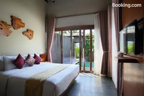 Bed in The Canggu Boutique Villas and Spa