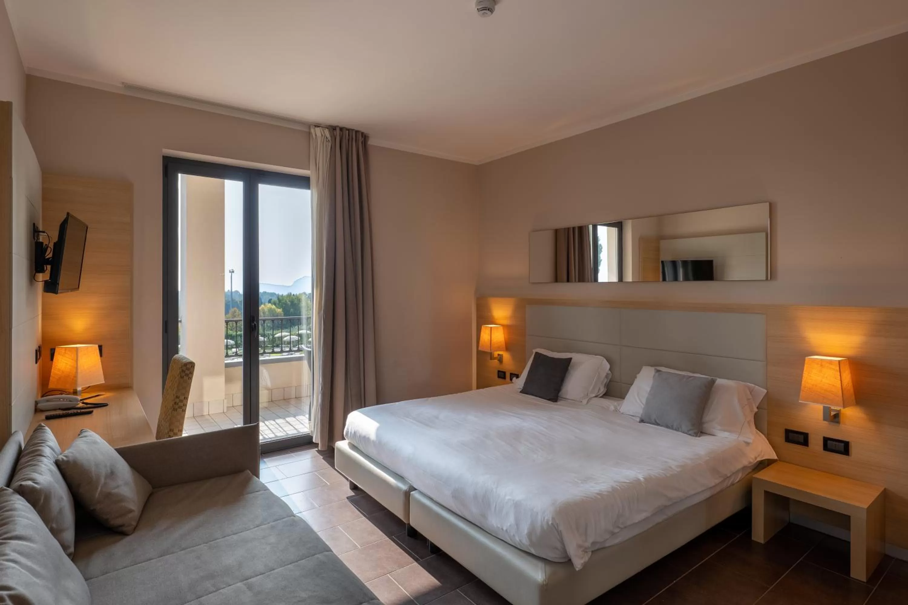 Bed in Villa Luisa Resort & Luxury Apartments