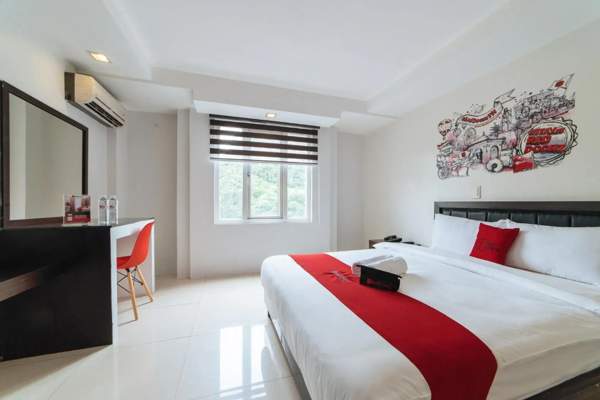 Photo of the whole room, Bed in RedDoorz Plus at One Liberty Hotel Kalayaan Avenue