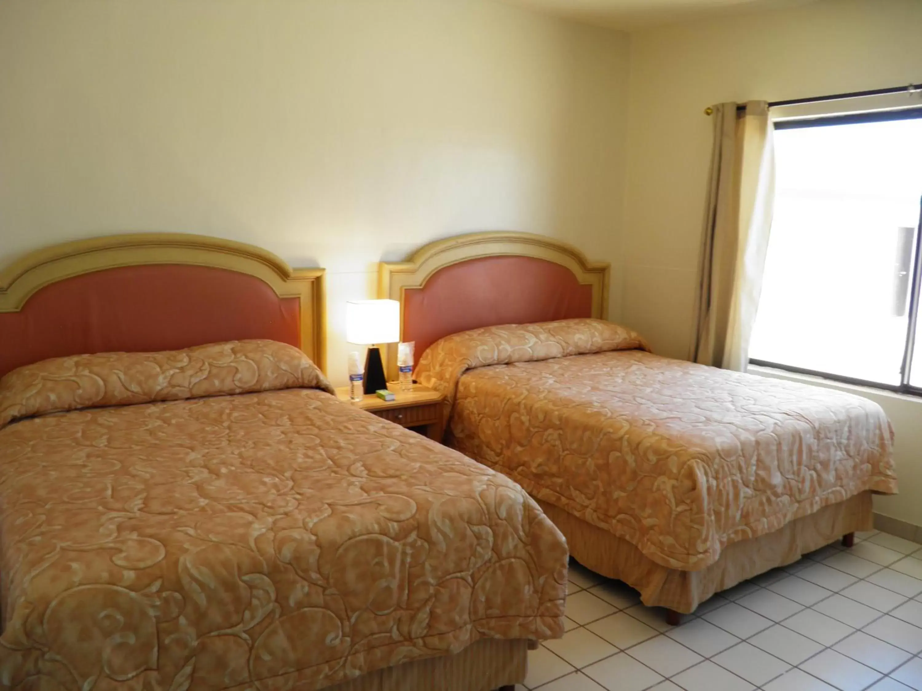 Bedroom, Bed in #52 Bungalow Seaside Hotel & Victors RV Park