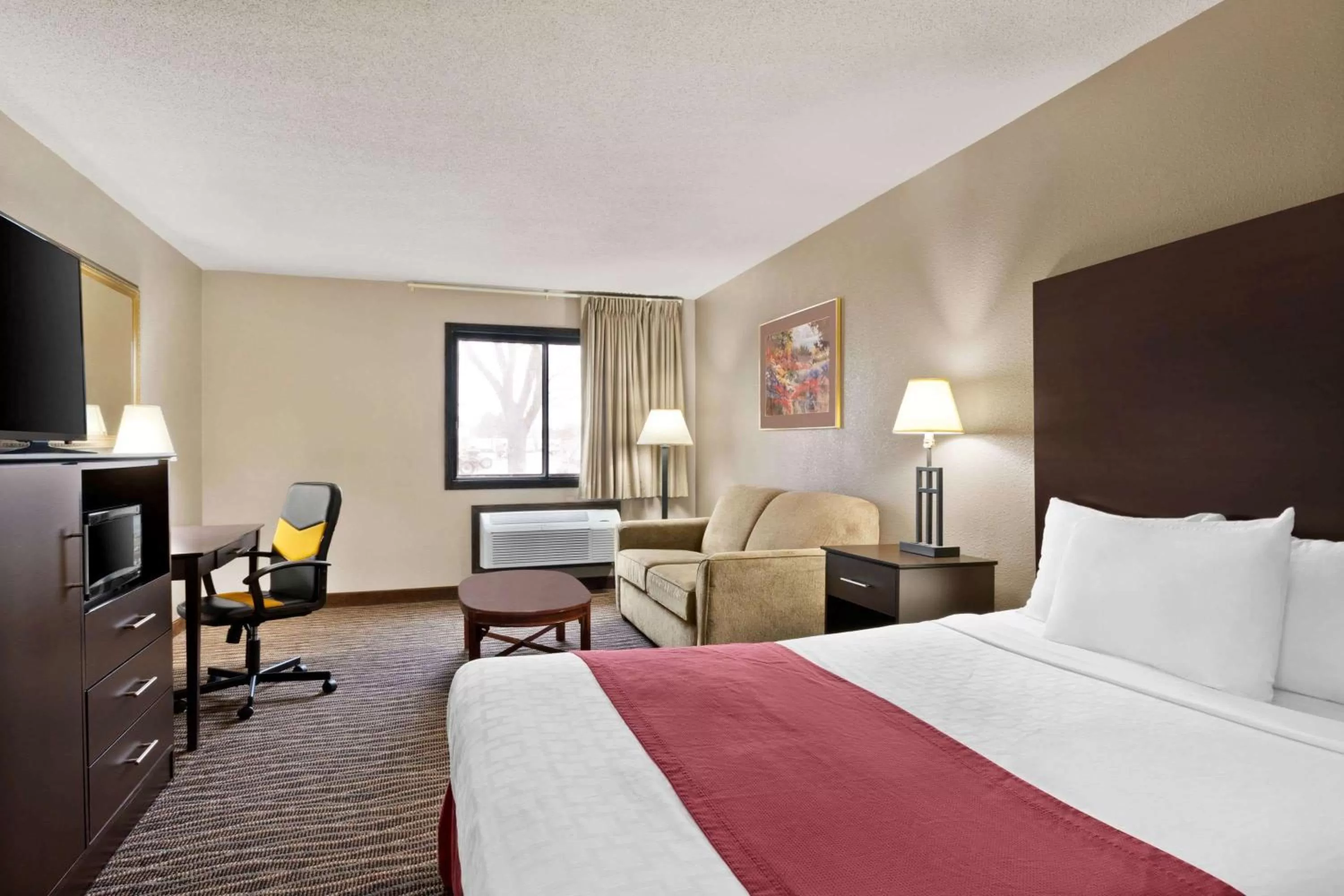 Photo of the whole room, Bed in Baymont by Wyndham Sioux Falls North,I-29,Russell St, Airport