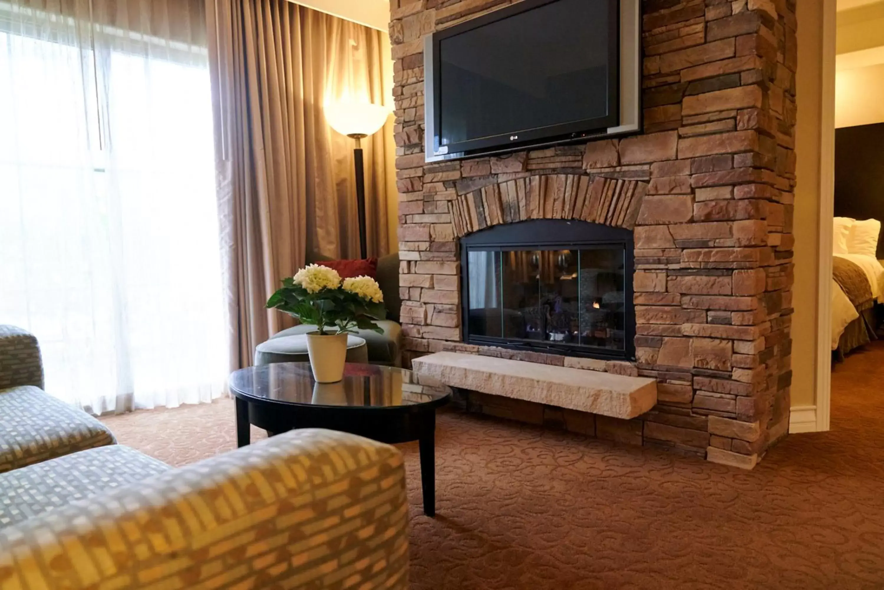 TV and multimedia, TV/Entertainment Center in La Bellasera Hotel And Suites