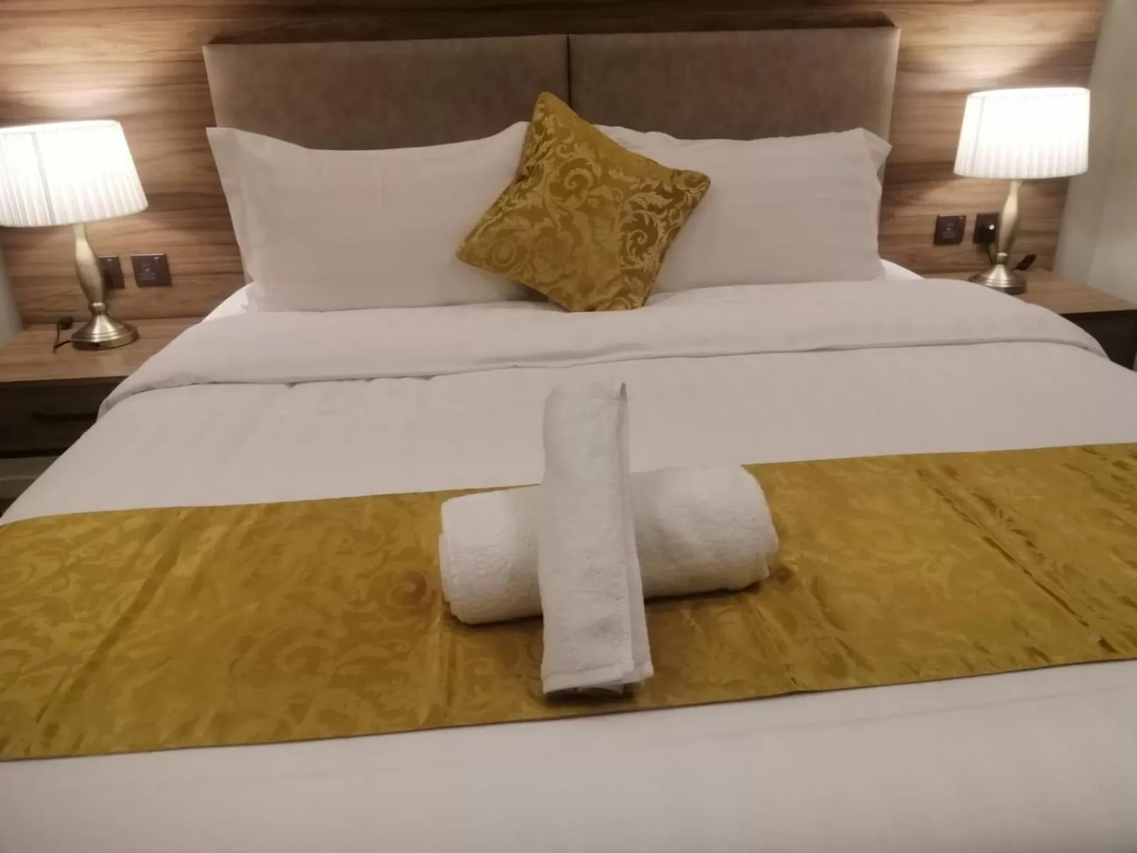 Bed in Vital House Apartments