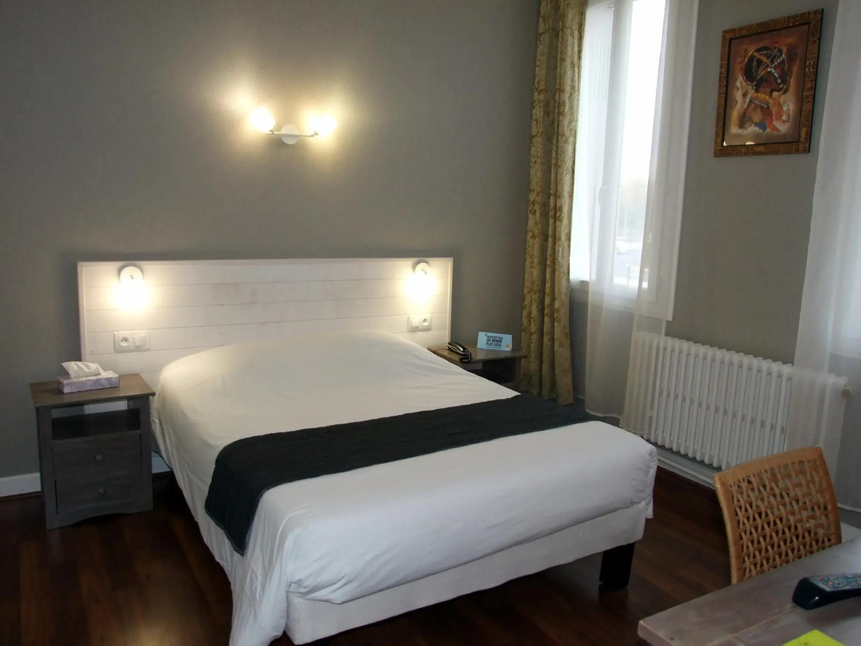 Photo of the whole room in Logis Hotel L'Occitan