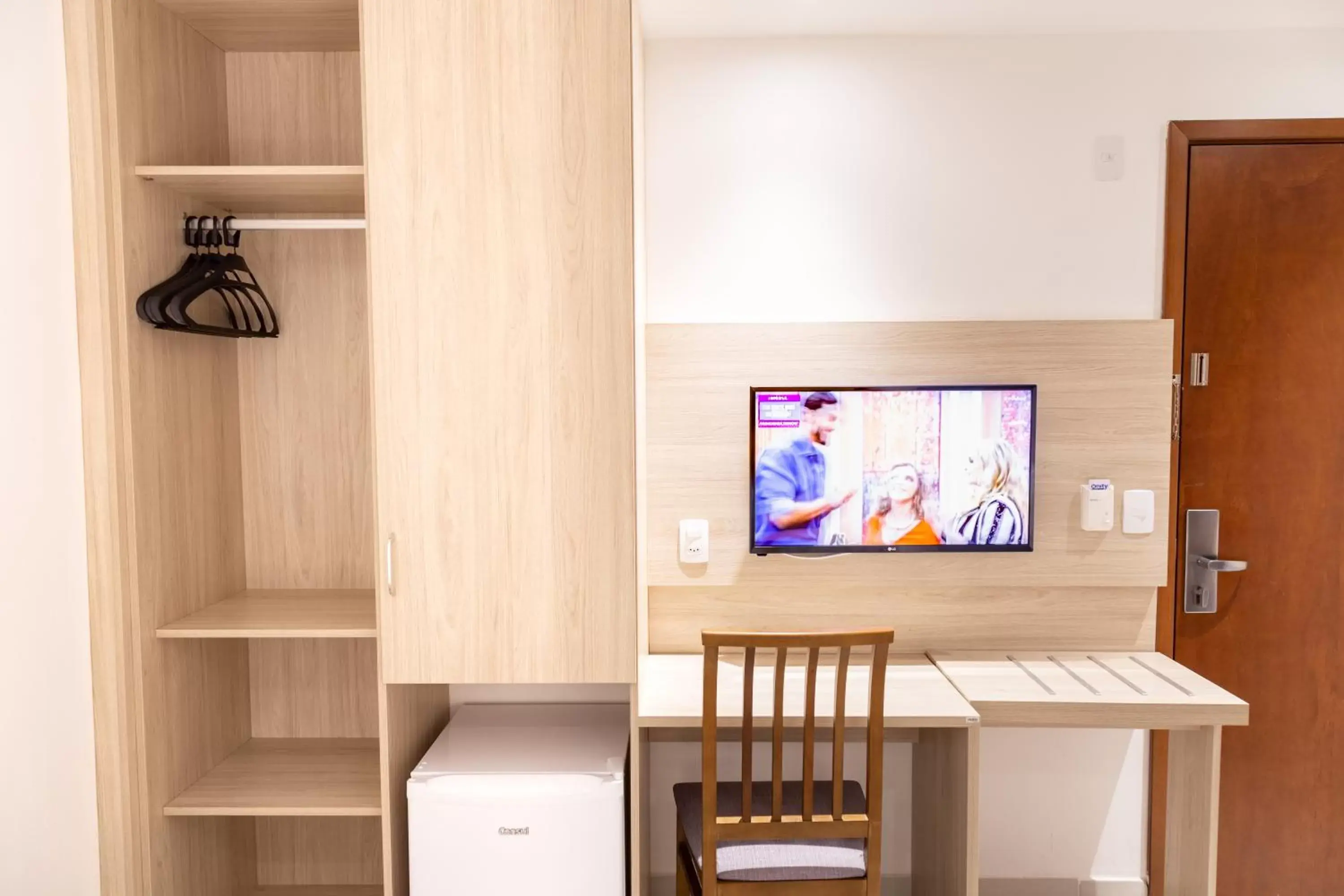 Bedroom, TV/Entertainment Center in Aquidabã Praia Hotel