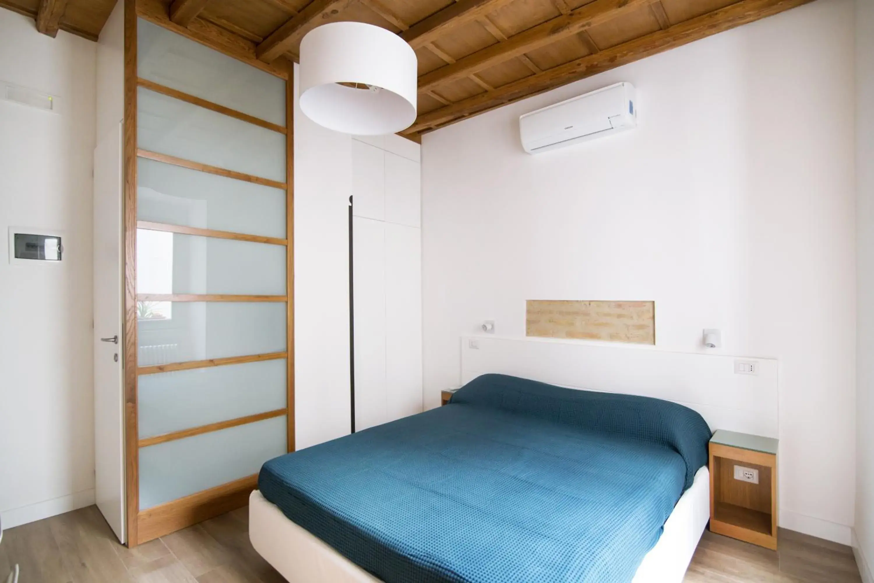 Bed in Domenichino Luxury Home