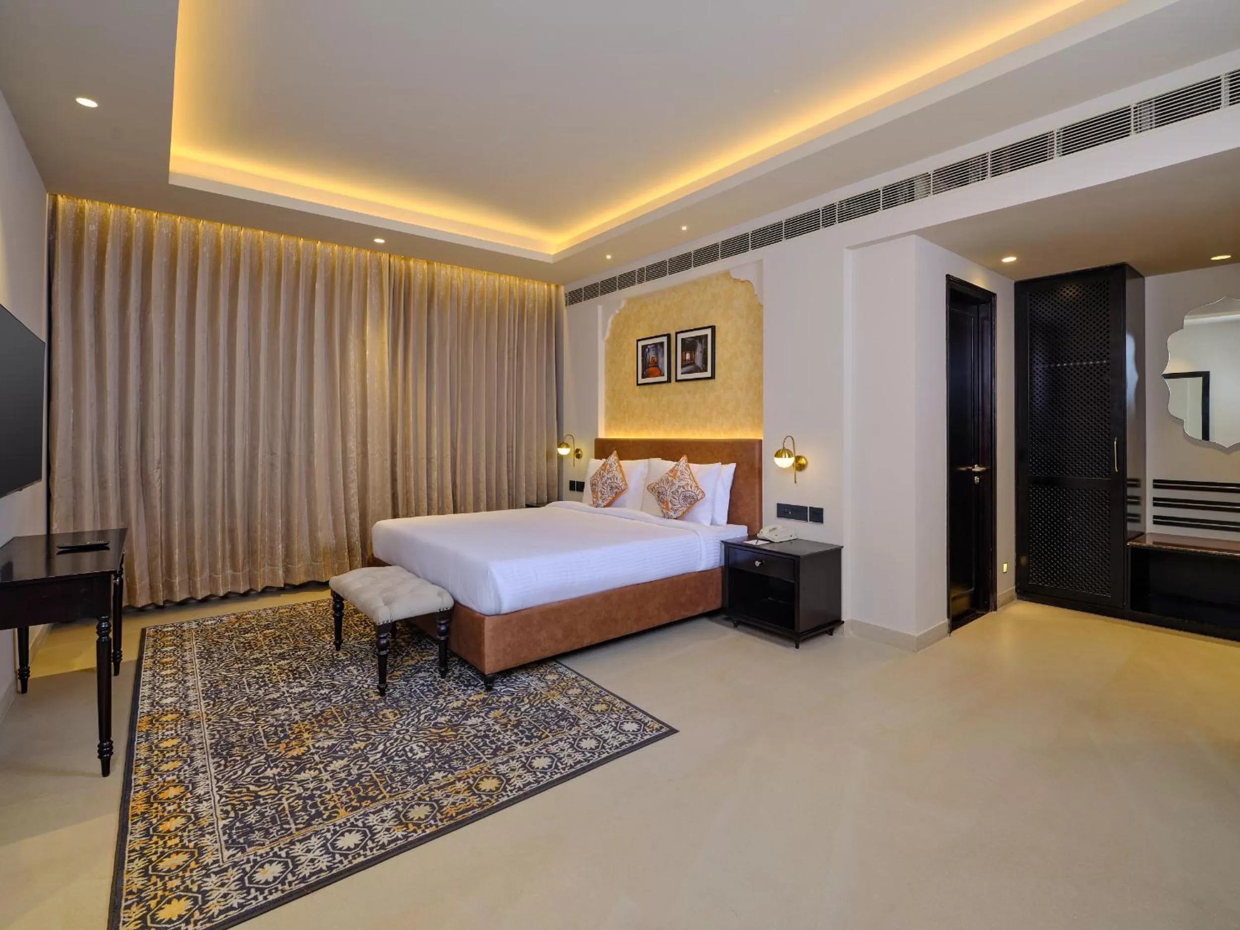 Bed in Pride Amber Vilas Resort & Convention Centre