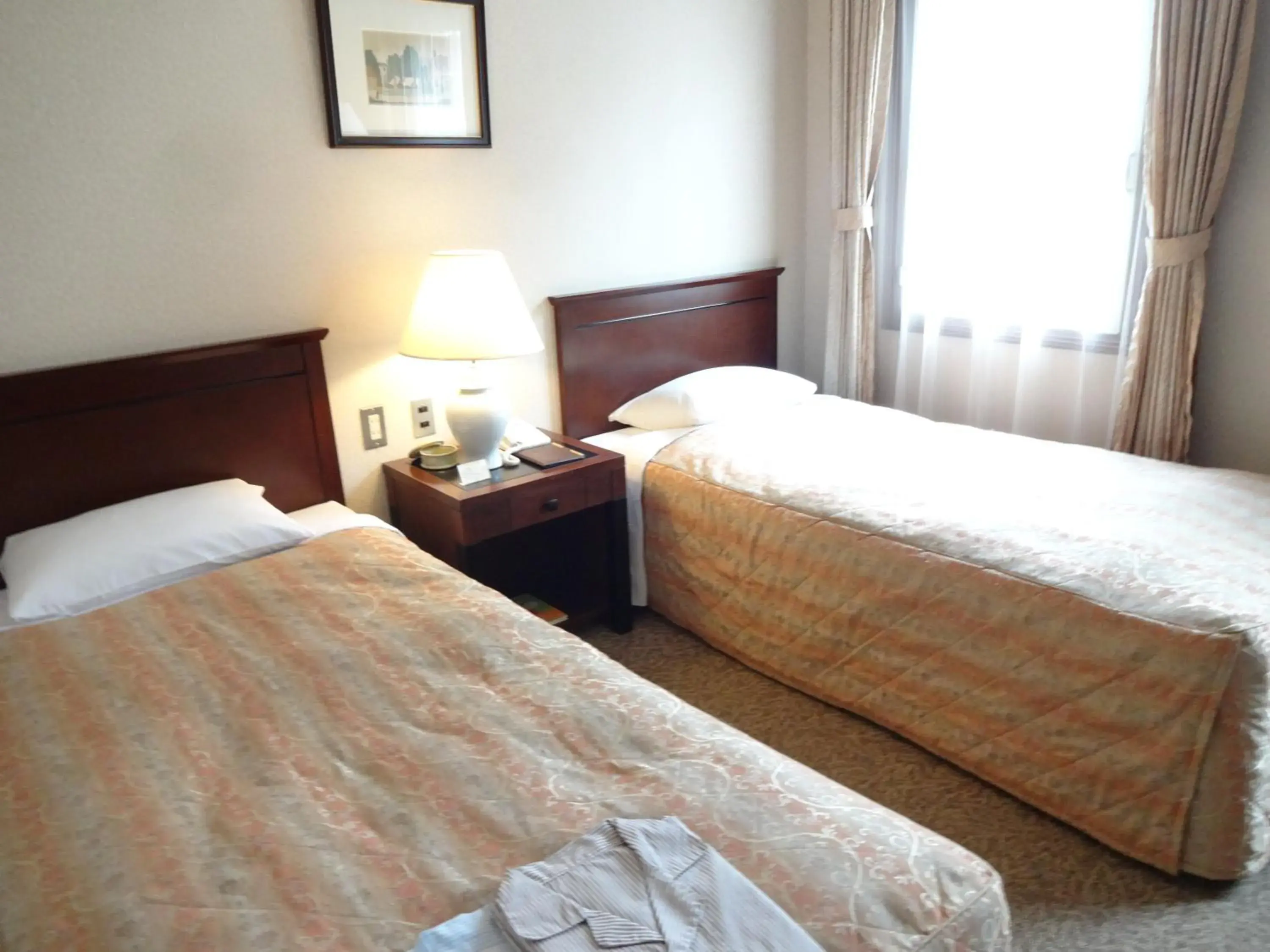 Bed in Kyu Karuizawa Hotel Otowa No Mori