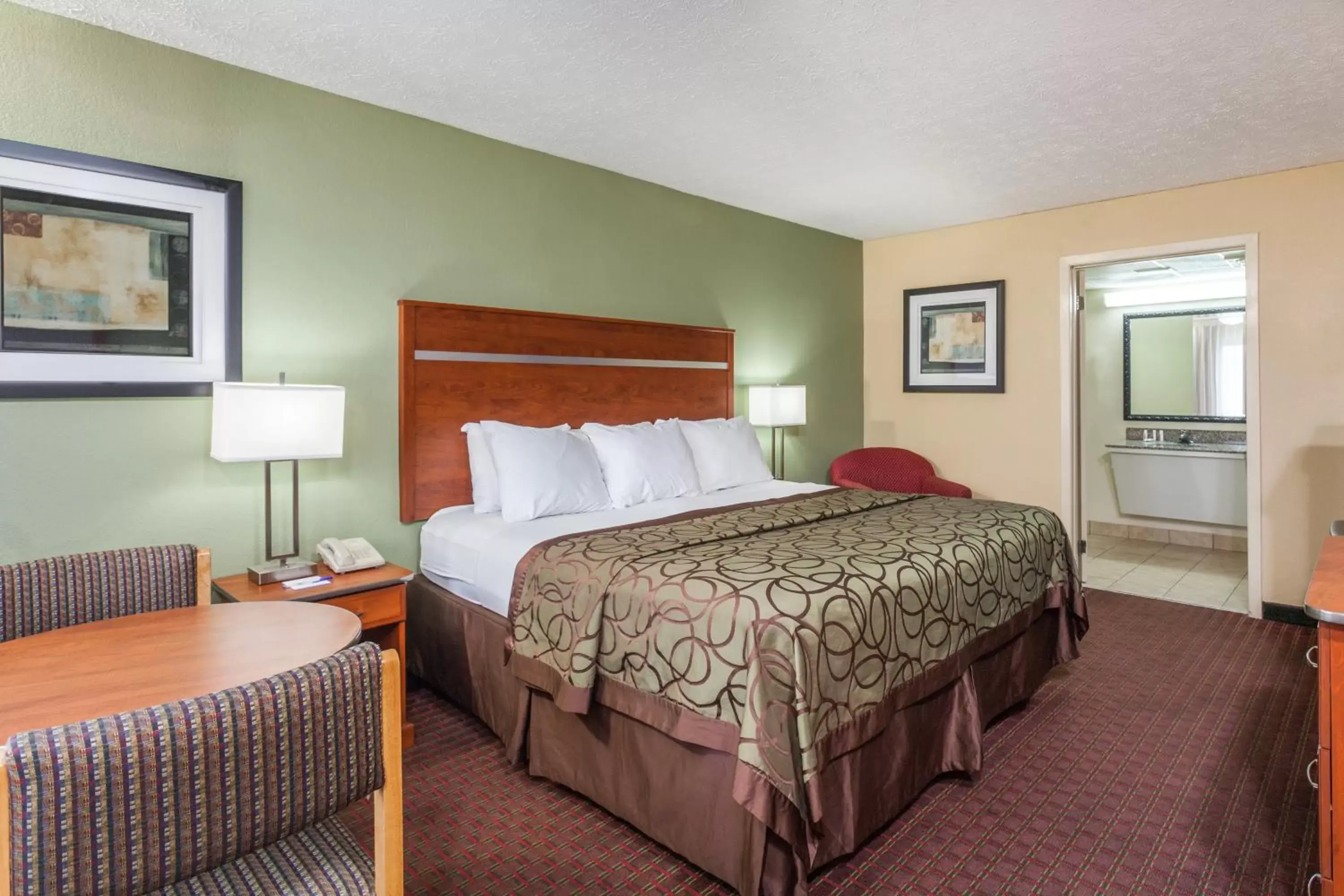 Bathroom, Bed in Baymont by Wyndham Pigeon Forge near Island Drive