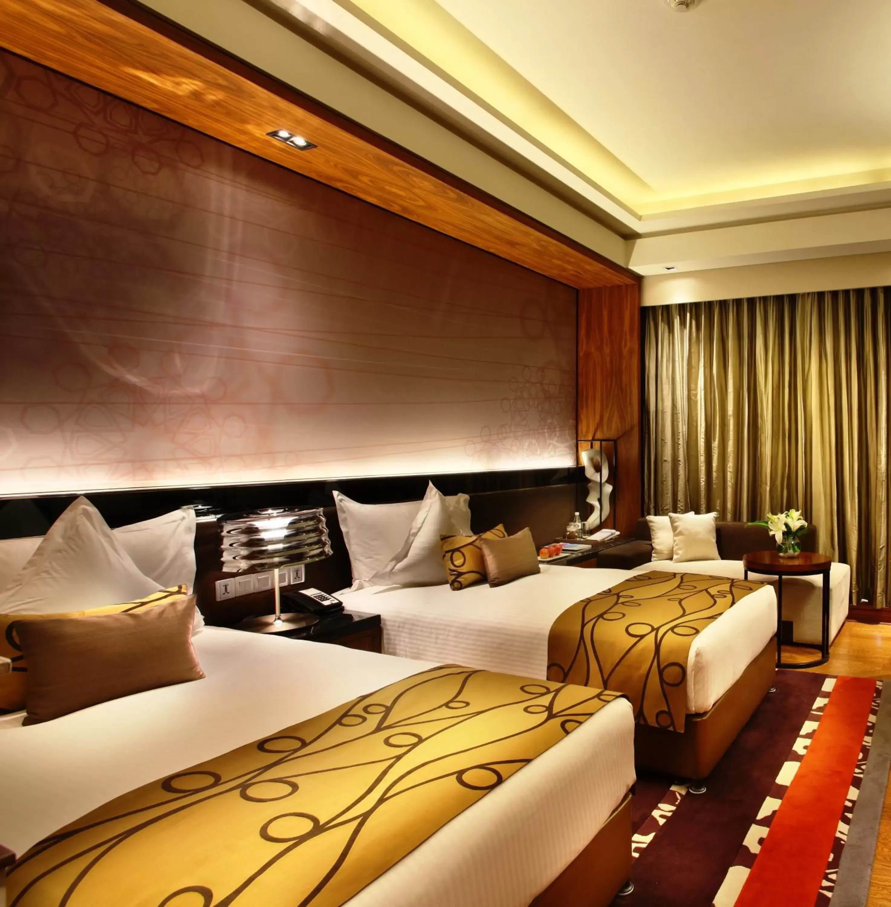 Bed in Crowne Plaza New Delhi Rohini, an IHG Hotel