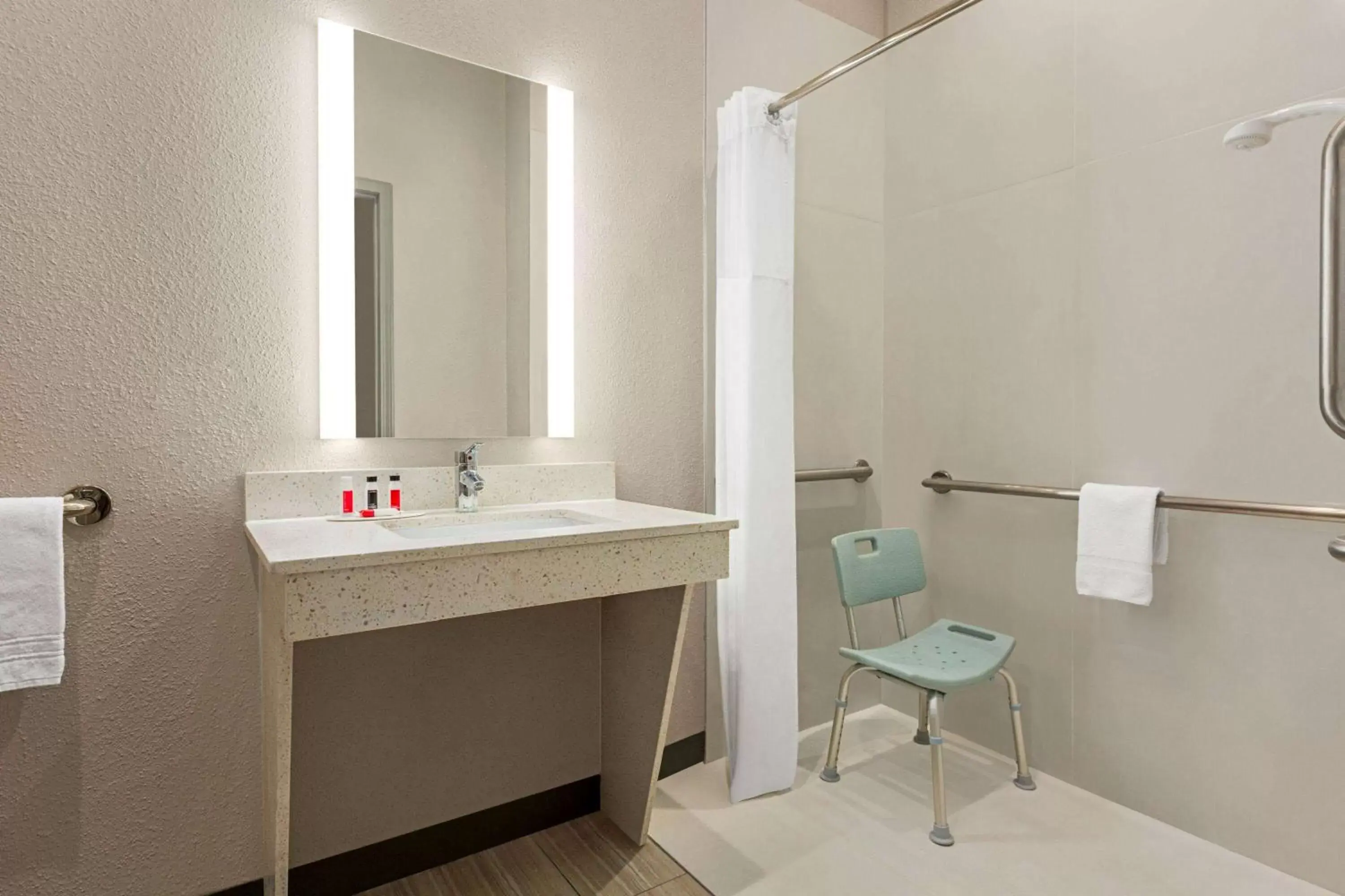 Shower, Bathroom in Days Inn & Suites by Wyndham Greater Tomball