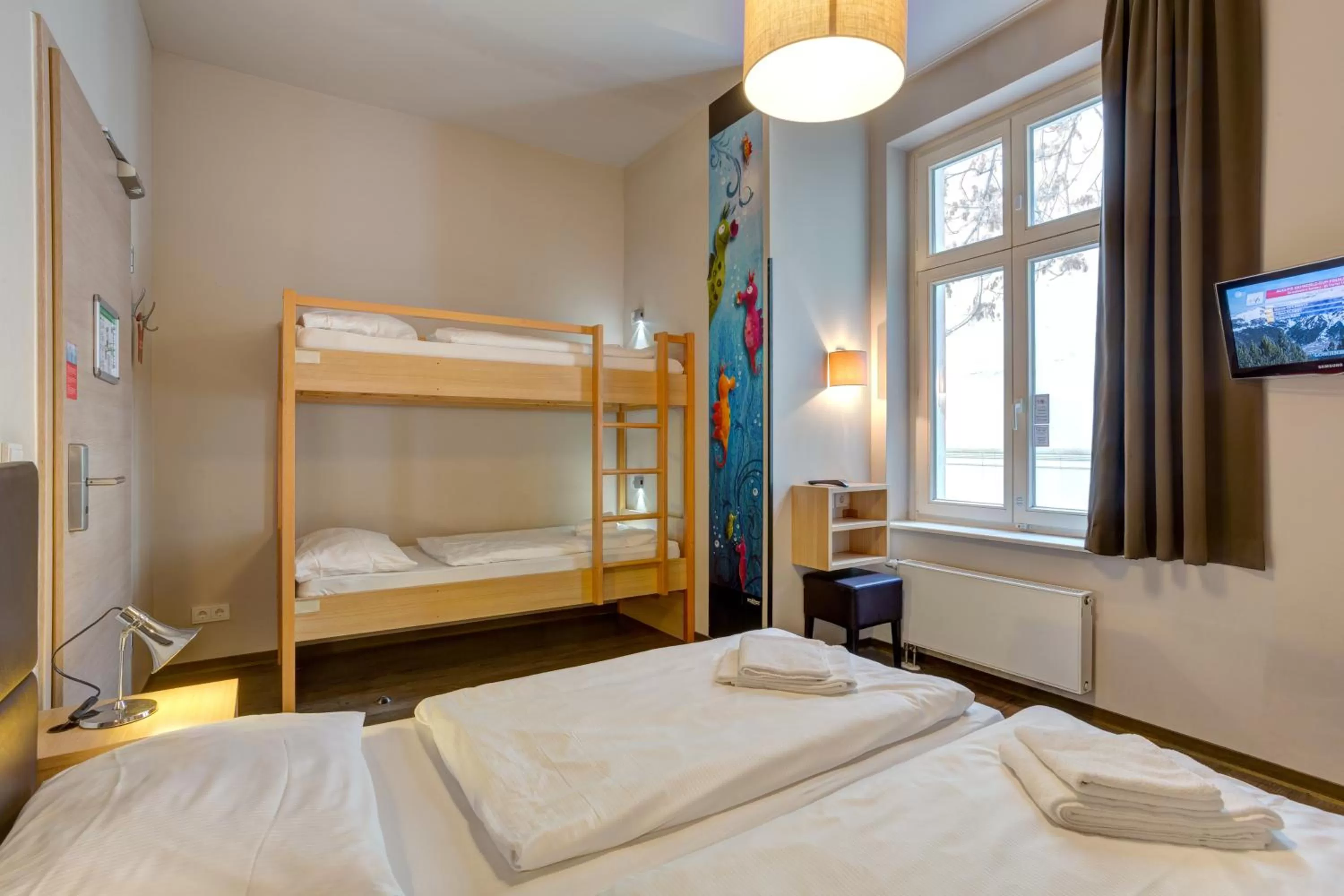 Photo of the whole room, Bed in MEININGER Hotel Berlin Mitte