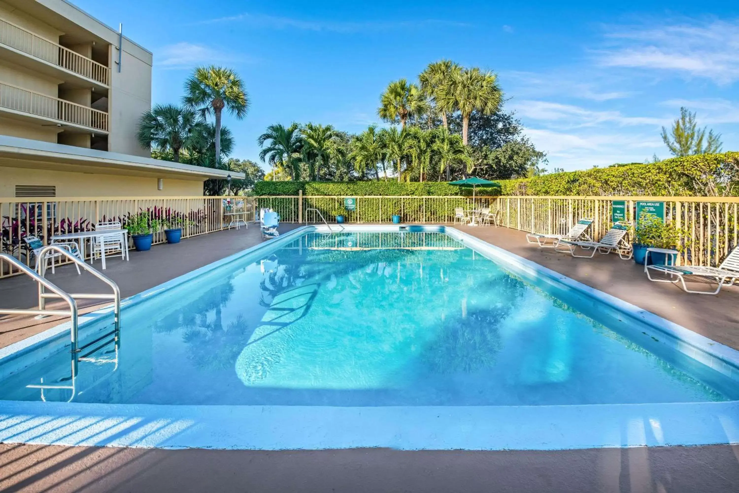 On site, Swimming Pool in La Quinta Inn by Wyndham West Palm Beach - Florida Turnpike