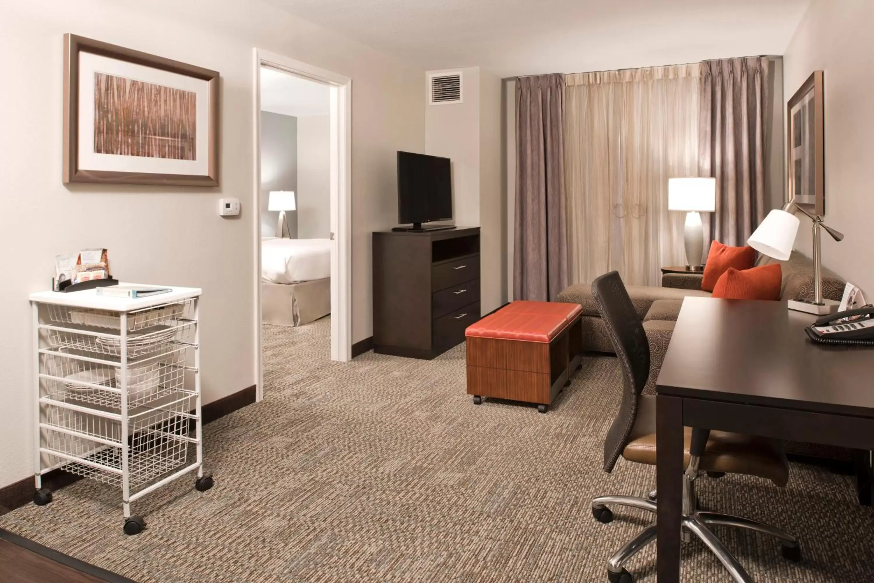 Photo of the whole room, TV/Entertainment Center in Staybridge Suites - Charlotte Ballantyne, an IHG Hotel