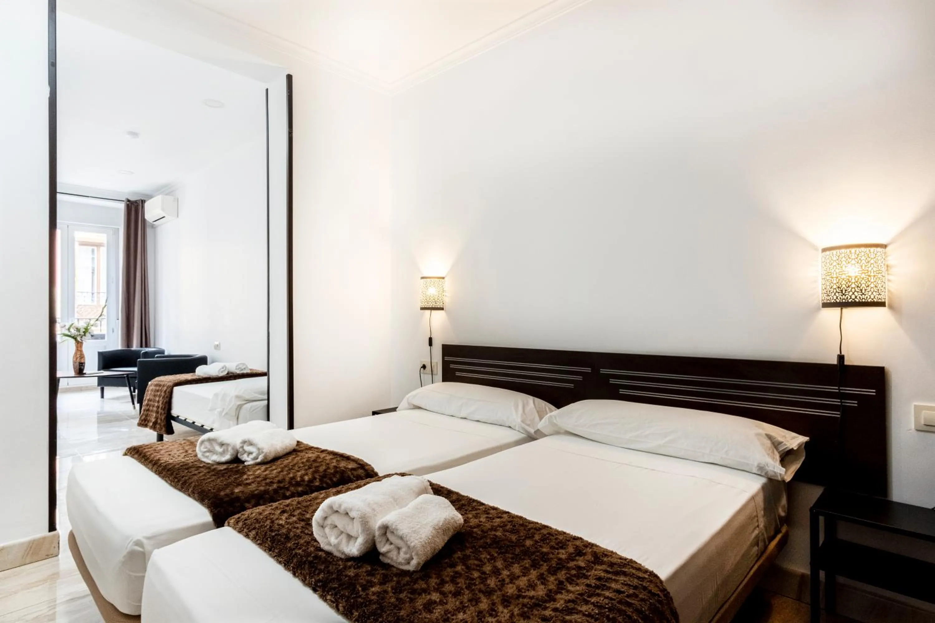 Photo of the whole room, Bed in Hostal Rincón de Sol - Centro Madrid - Self Checkin