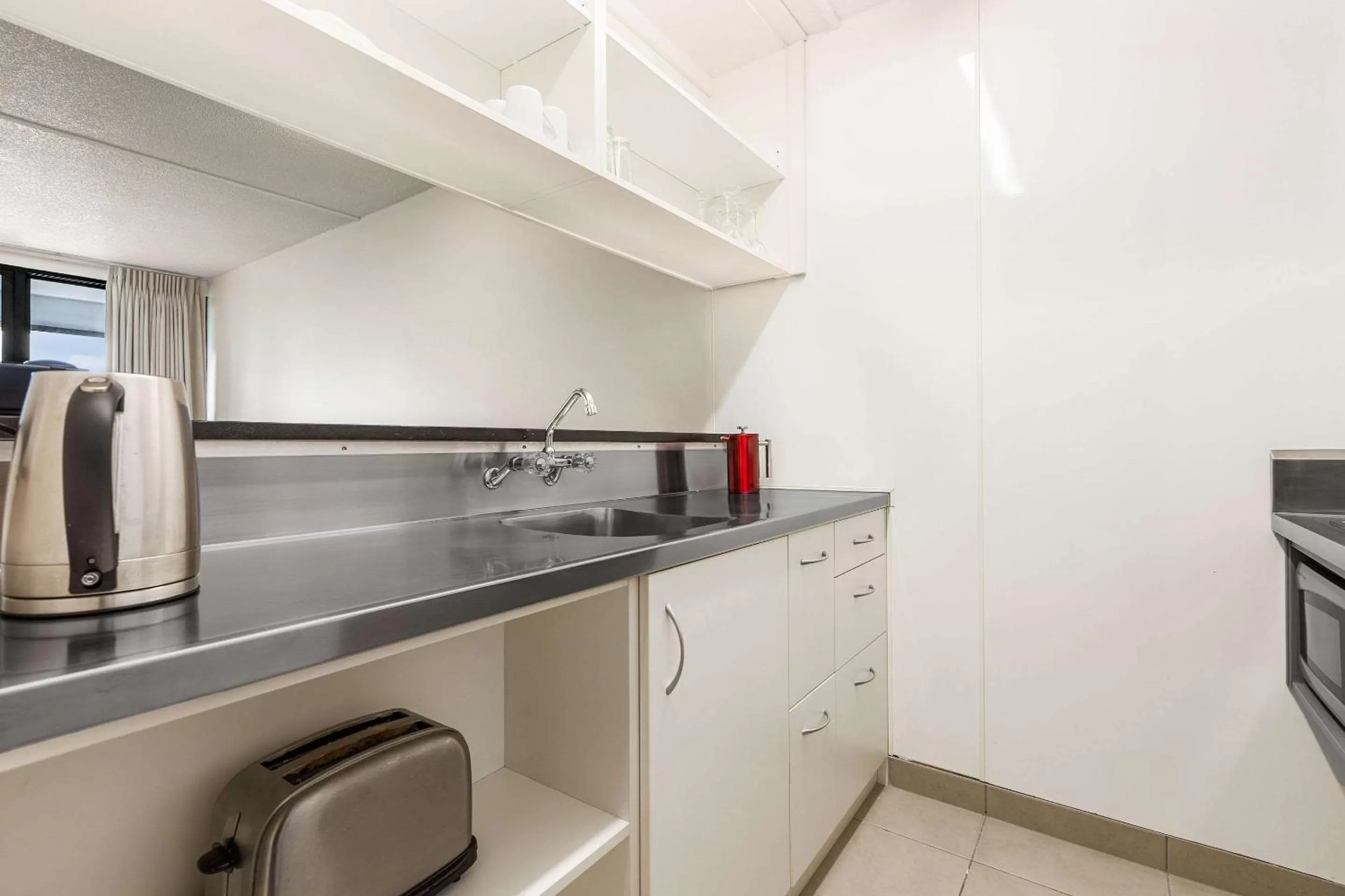 Kitchen or kitchenette in The Parnell Hotel & Conference Centre