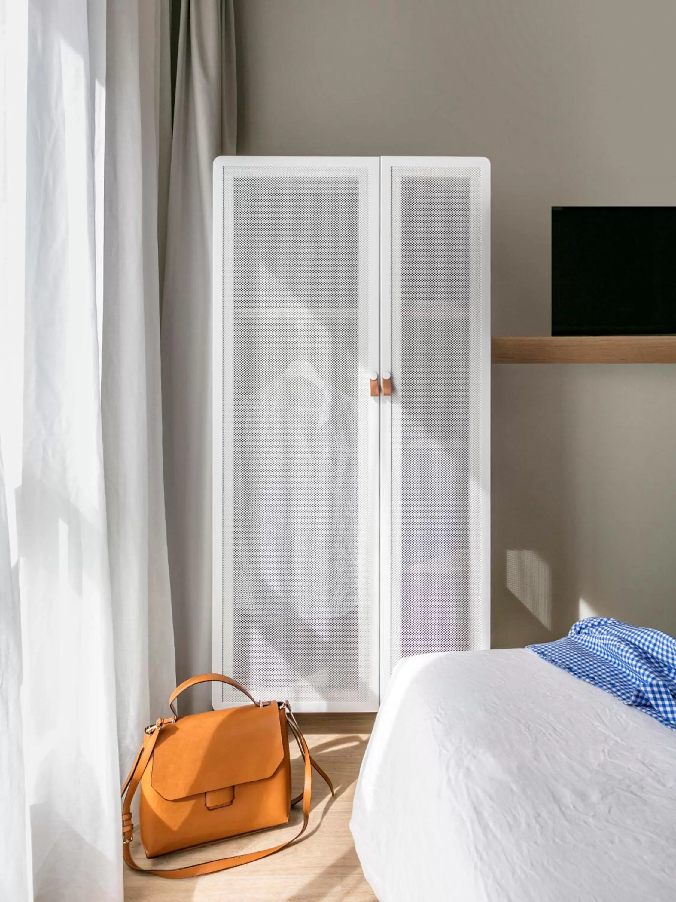 wardrobe, Bed in OKKO Hotels Paris La Défense