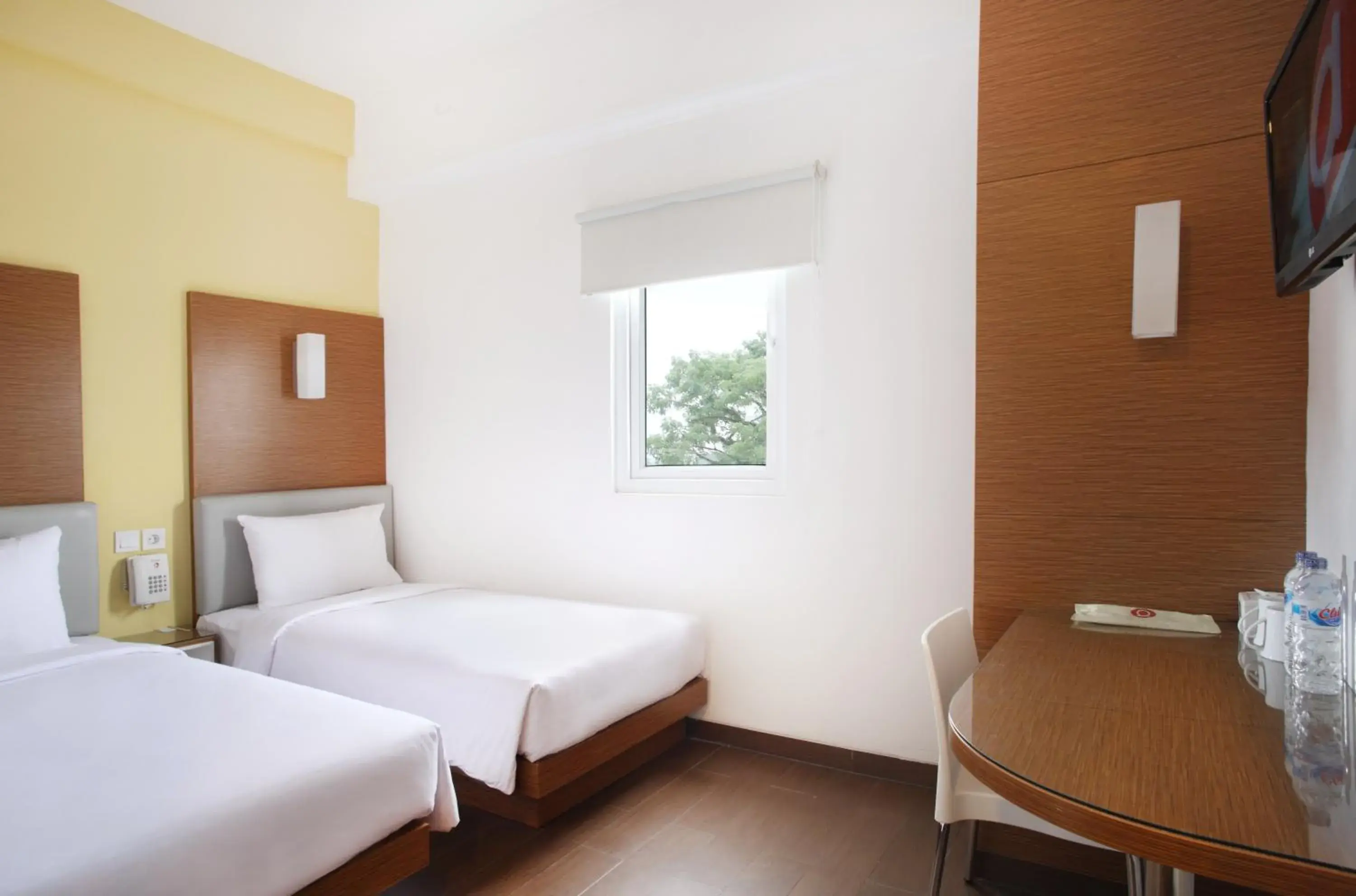 Photo of the whole room, Bed in Amaris Hotel Malang