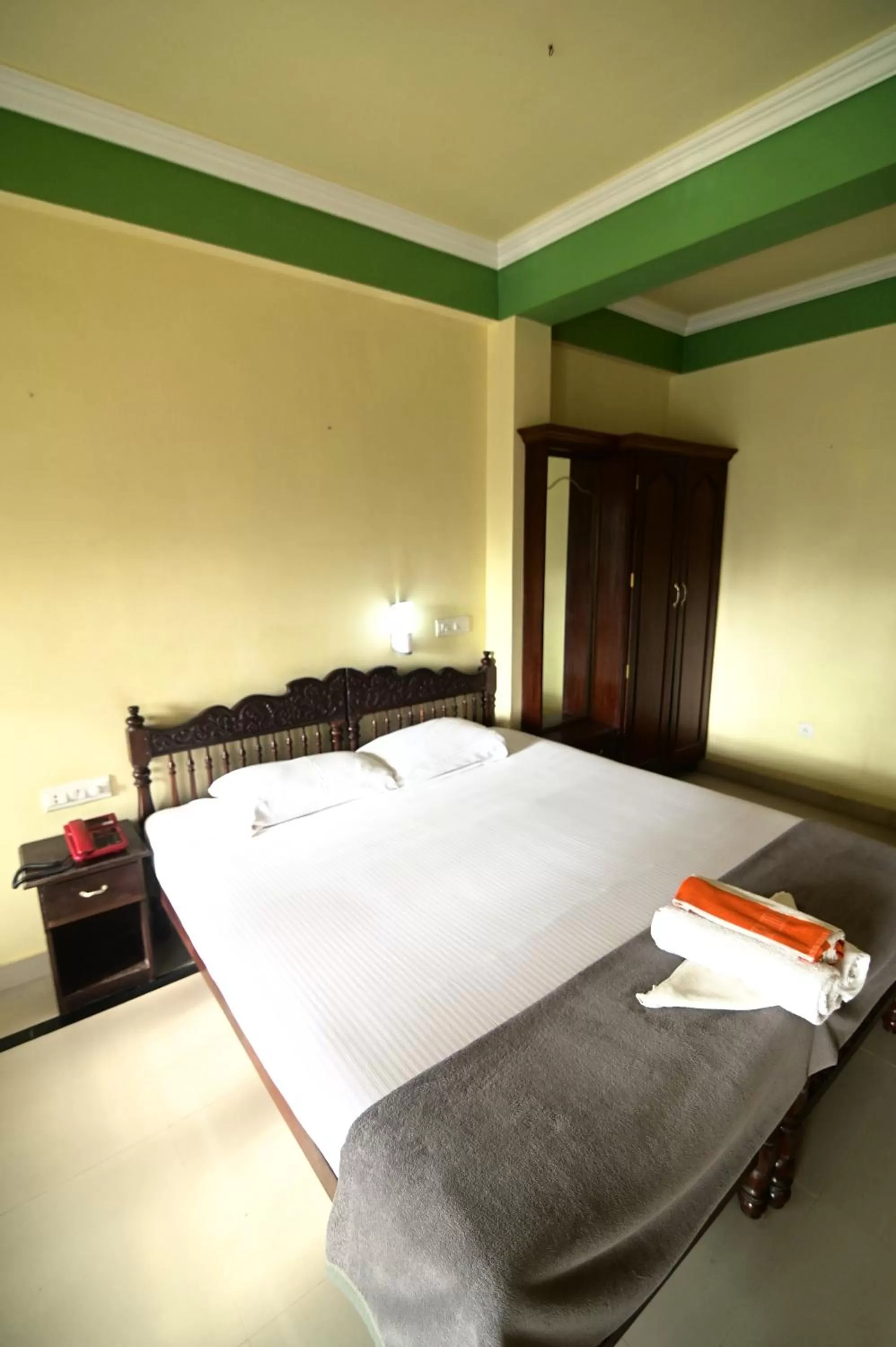 Bed in Sree Mookambika Beach Resort