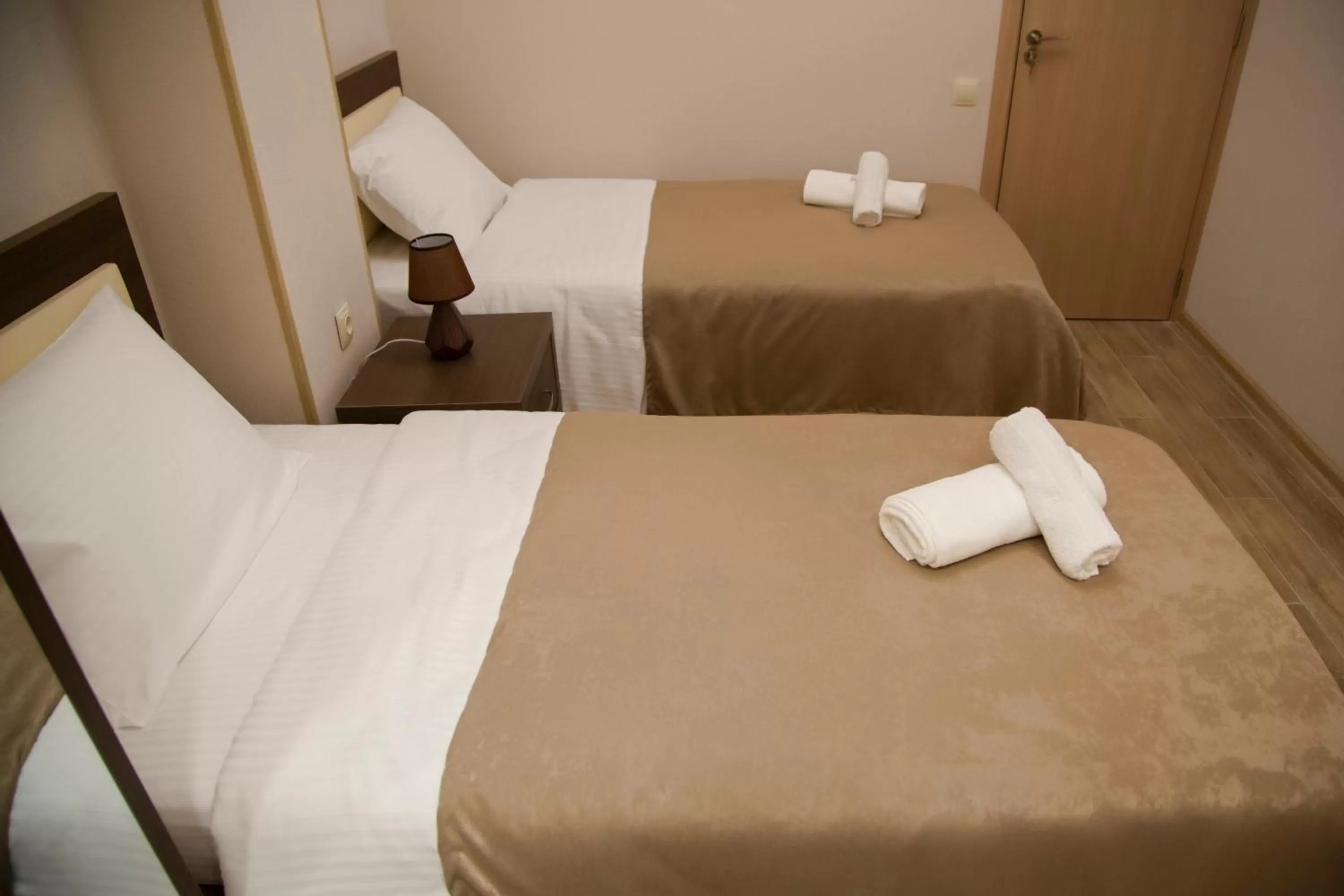 Bed in Family Hotel Triston