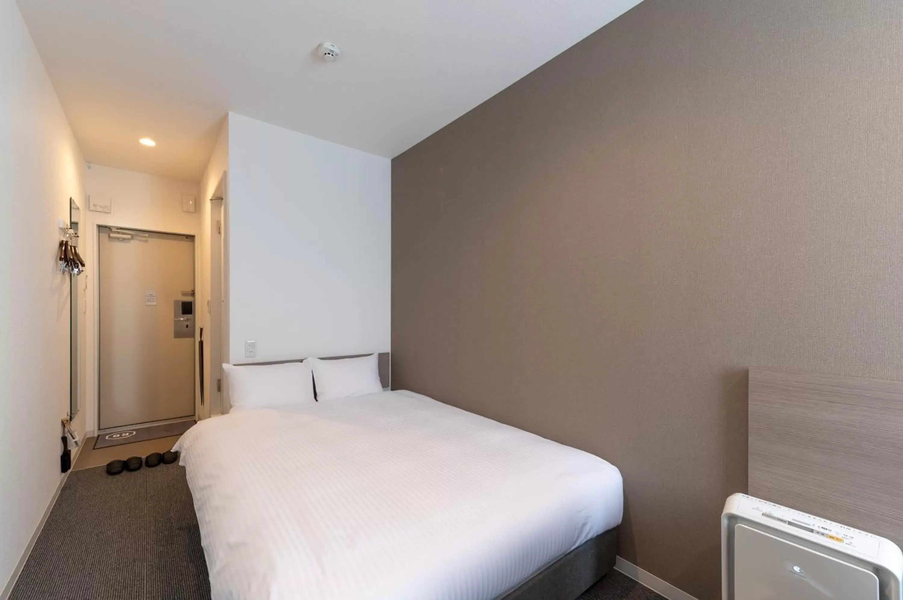 Bed in HOTEL R9 The Yard Taketoyo Bed in HOTEL R9 The Yard Taketoyo