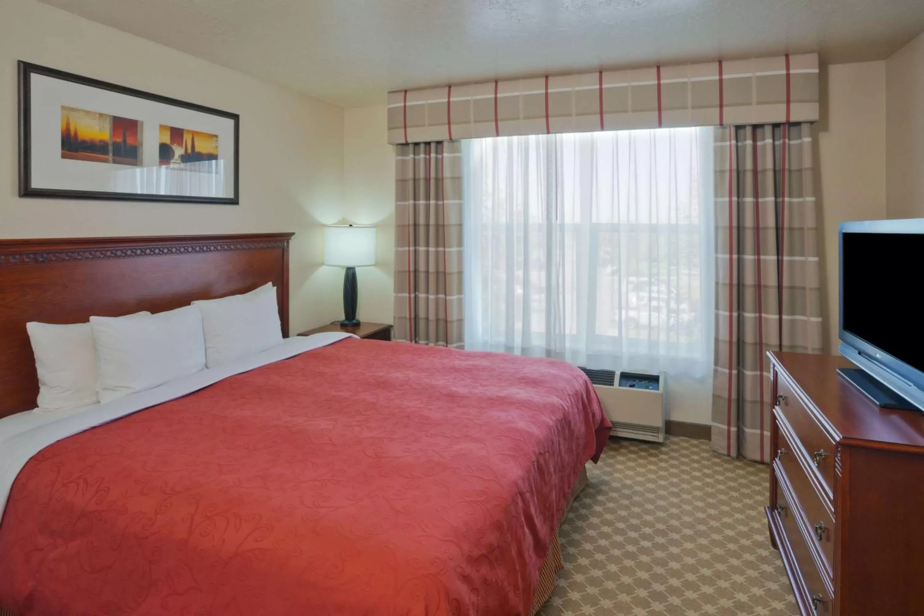 Photo of the whole room, Bed in Country Inn & Suites by Radisson, West Valley City, UT