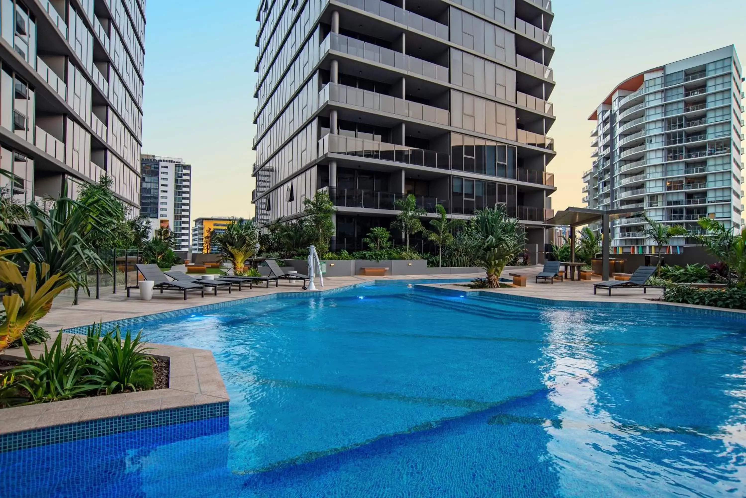 Property building, Swimming Pool in Brisbane One Apartments by CLLIX