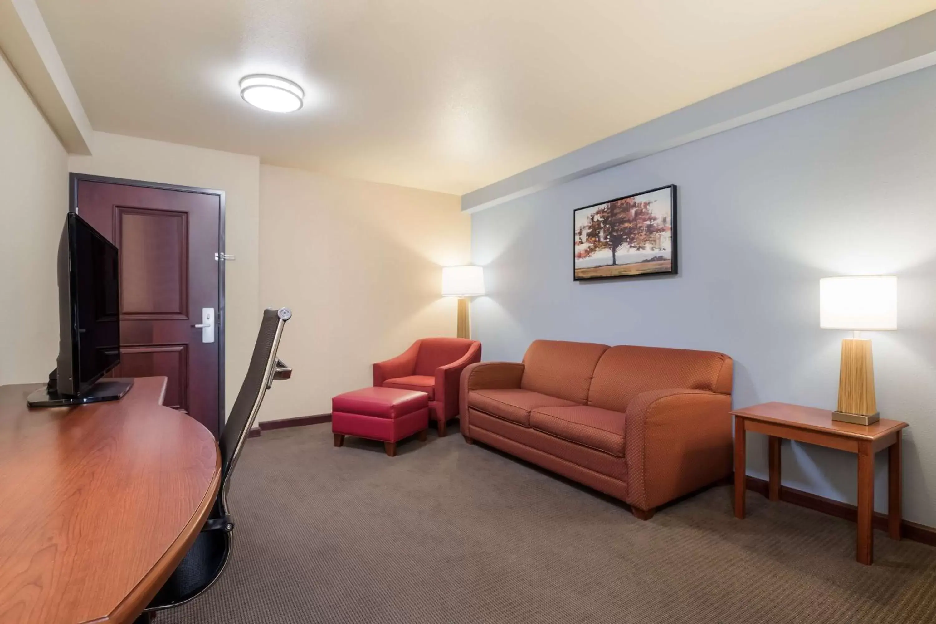 Bedroom, Seating Area in Best Western Coffeyville Central Business District Inn and Suites