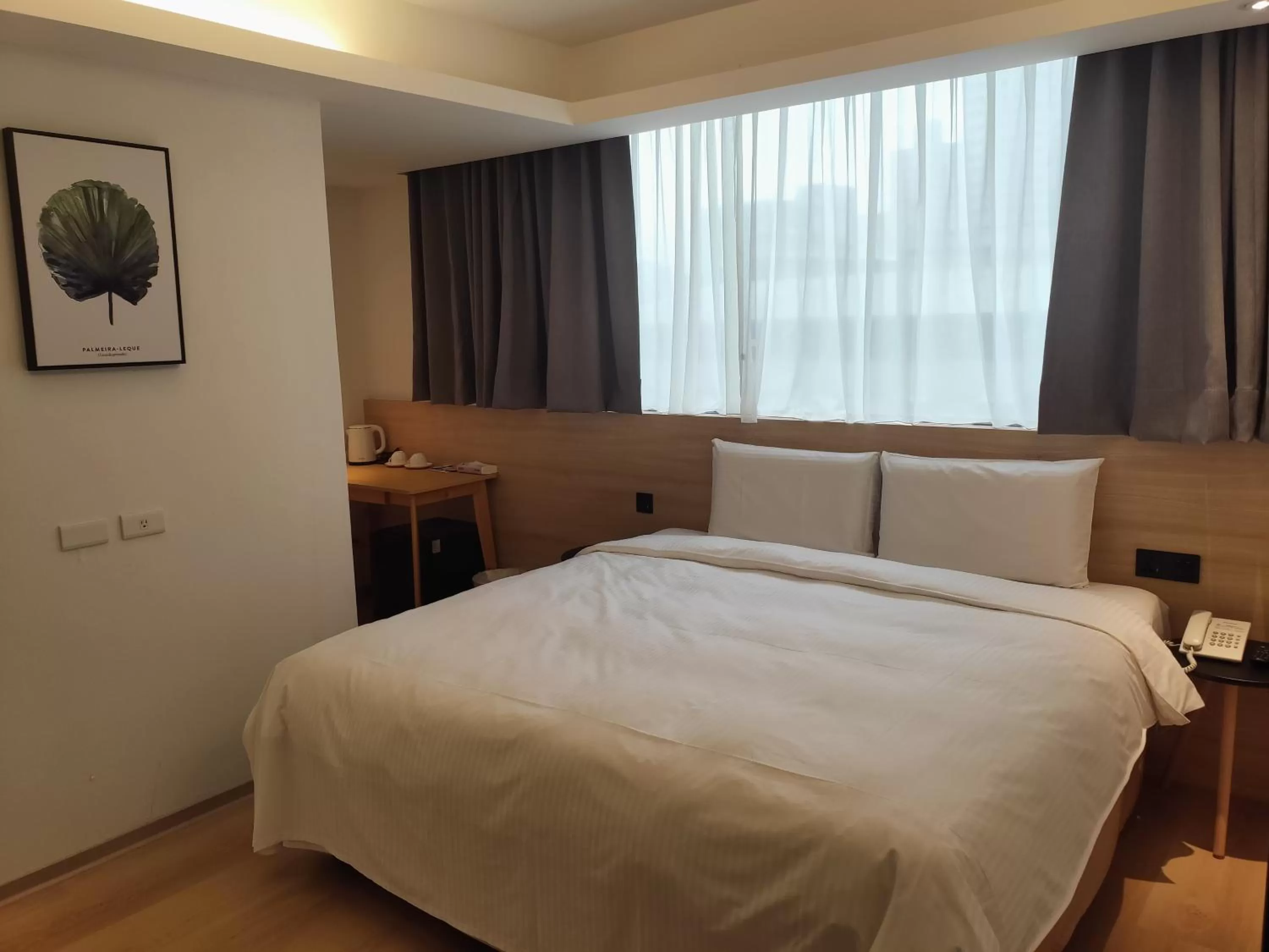 Bed in Fooyee Hotel - Yonghe