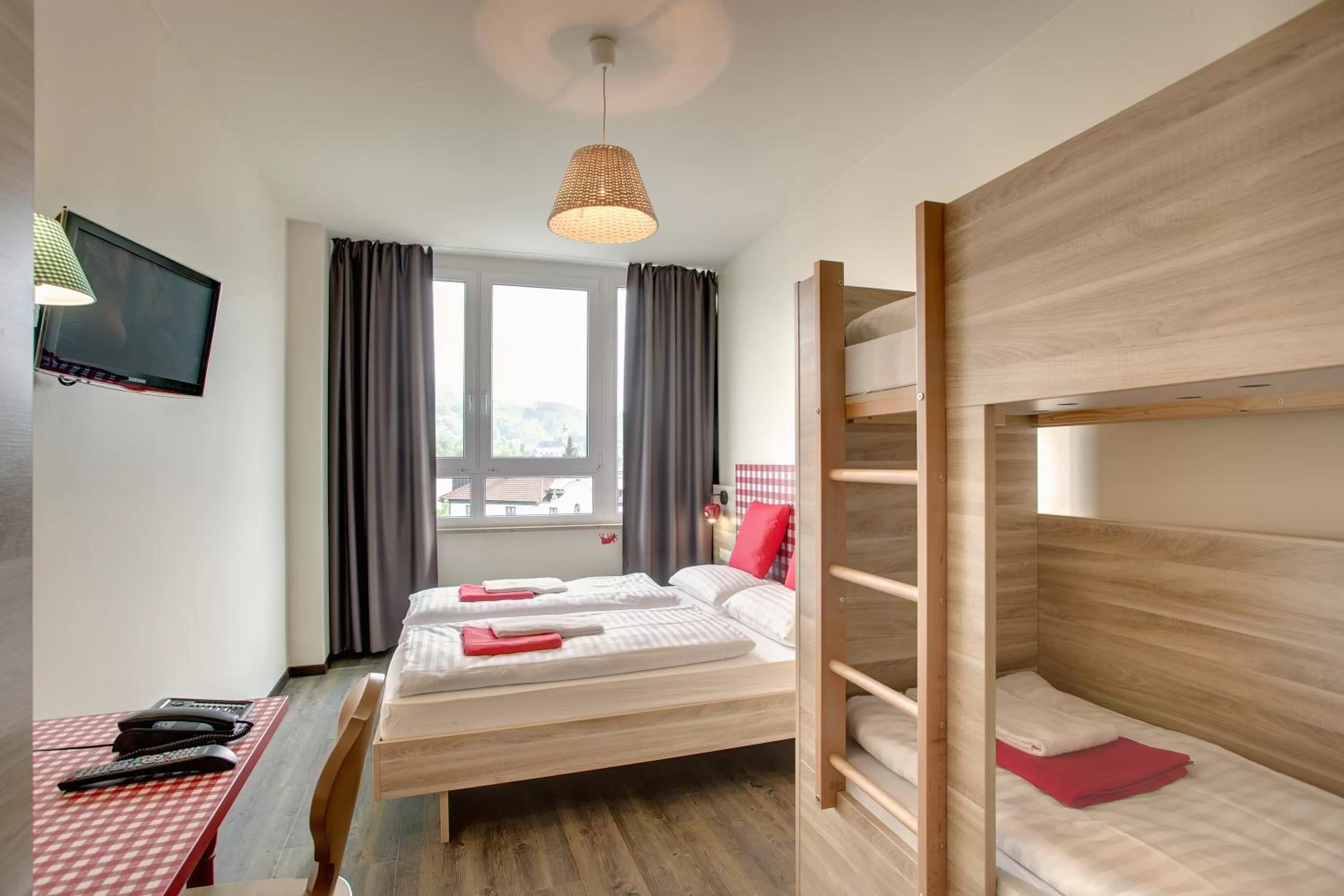 Photo of the whole room, Bed in MEININGER Hotel Salzburg City Center