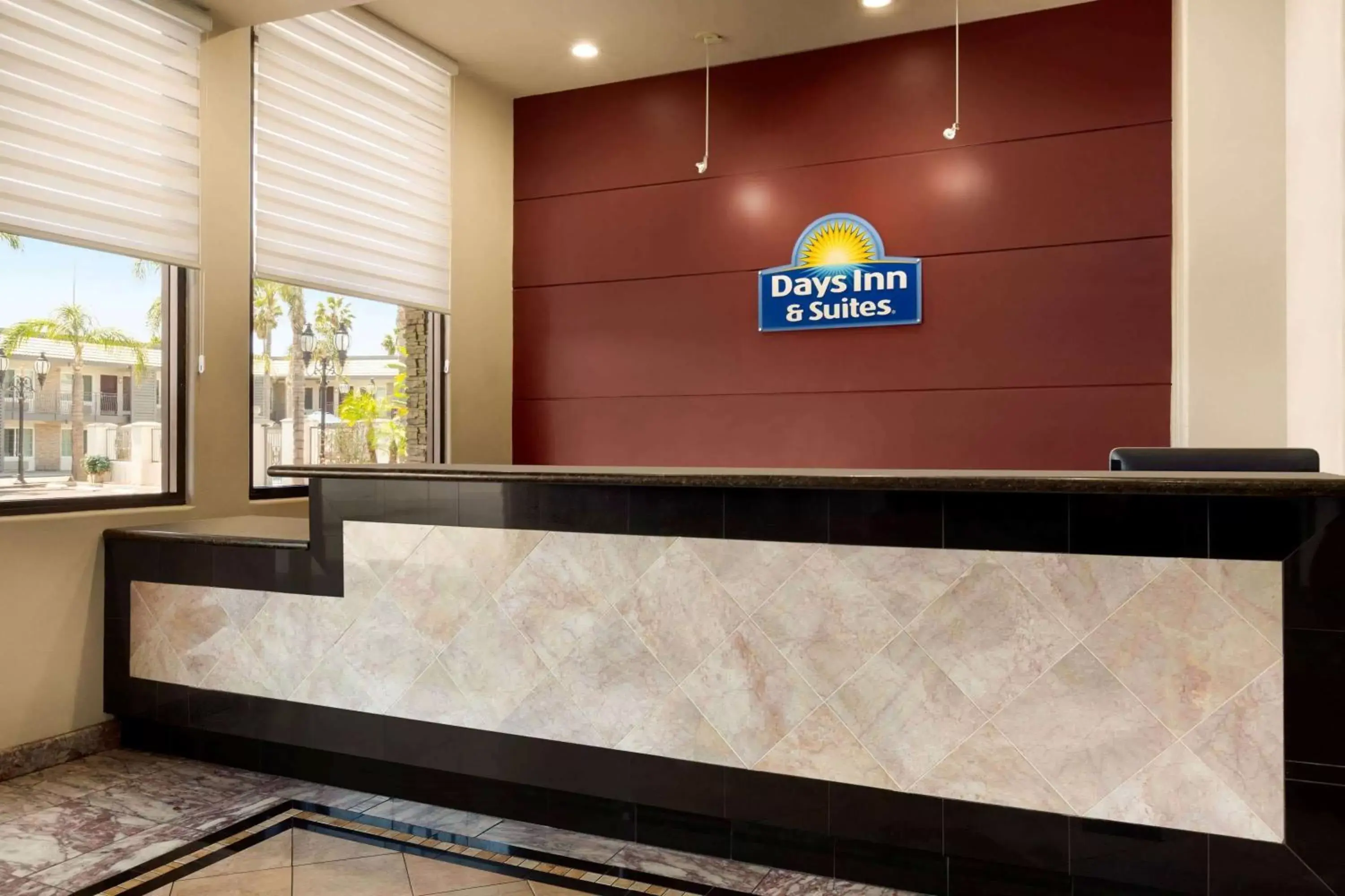 Lobby or reception in Days Inn & Suites by Wyndham Anaheim At Disneyland Park Lobby or reception in Days Inn & Suites by Wyndham Anaheim At Disneyland Park