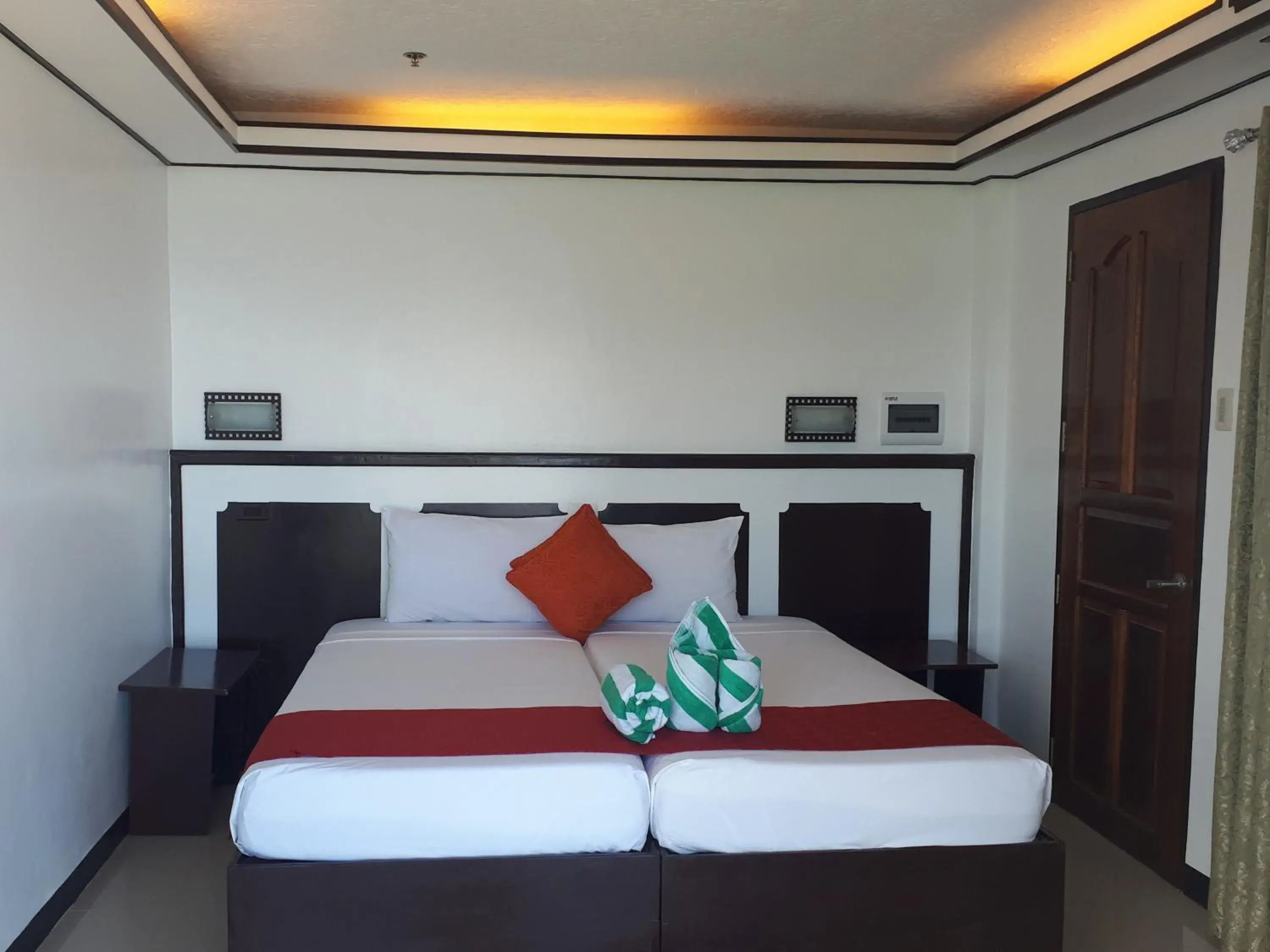 Bed in Orange Pearl Beach Resort