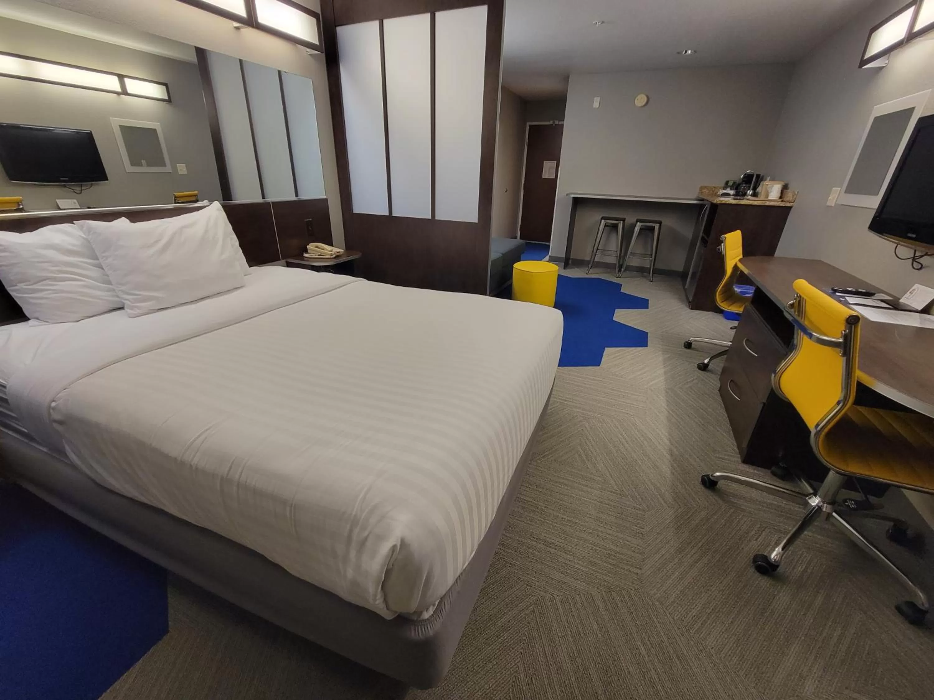 Bed in Microtel Inn & Suites by Wyndham Bluffs