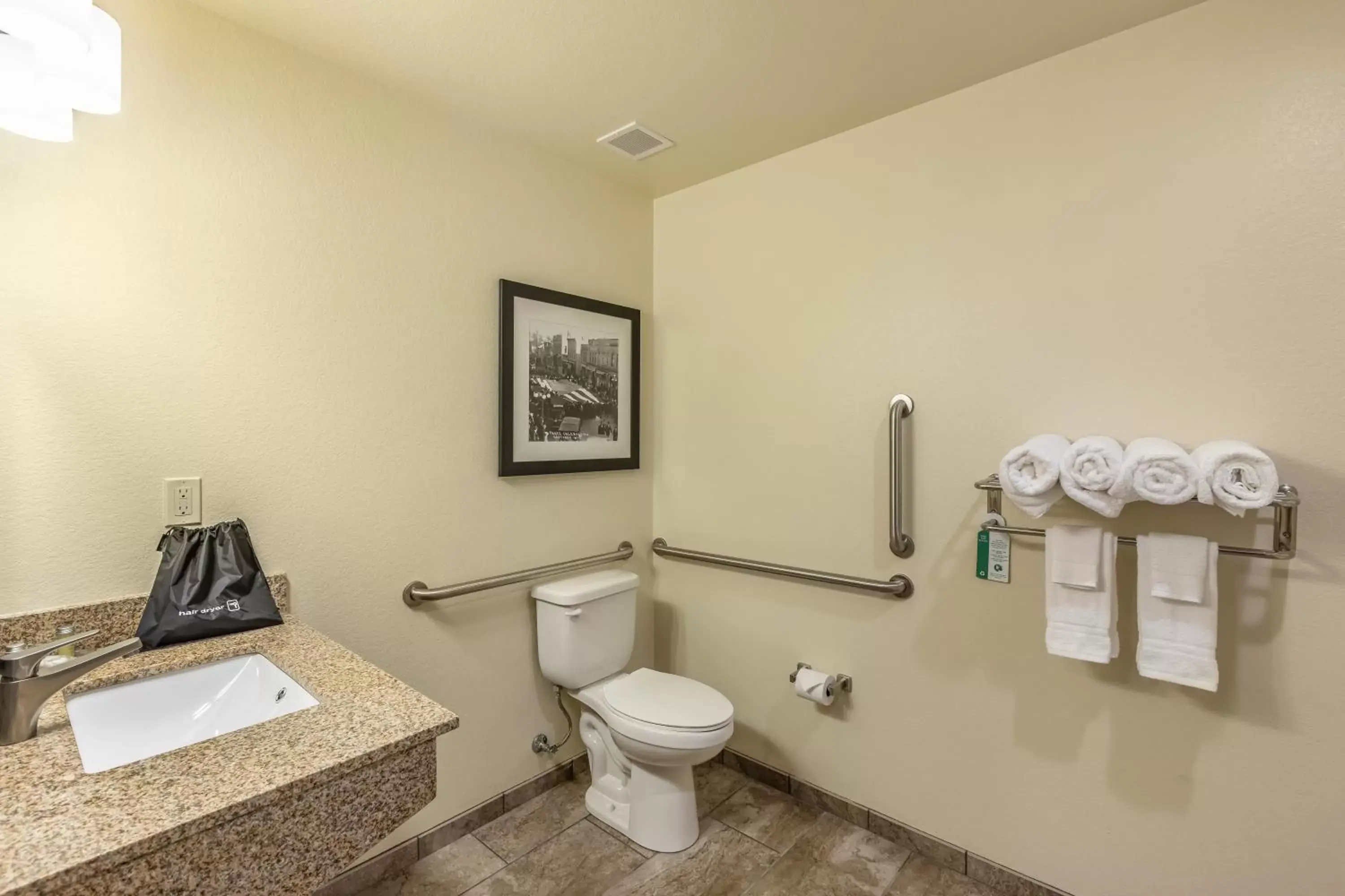 Toilet, Bathroom in Cobblestone Inn & Suites - Menomonie/UW-Stout