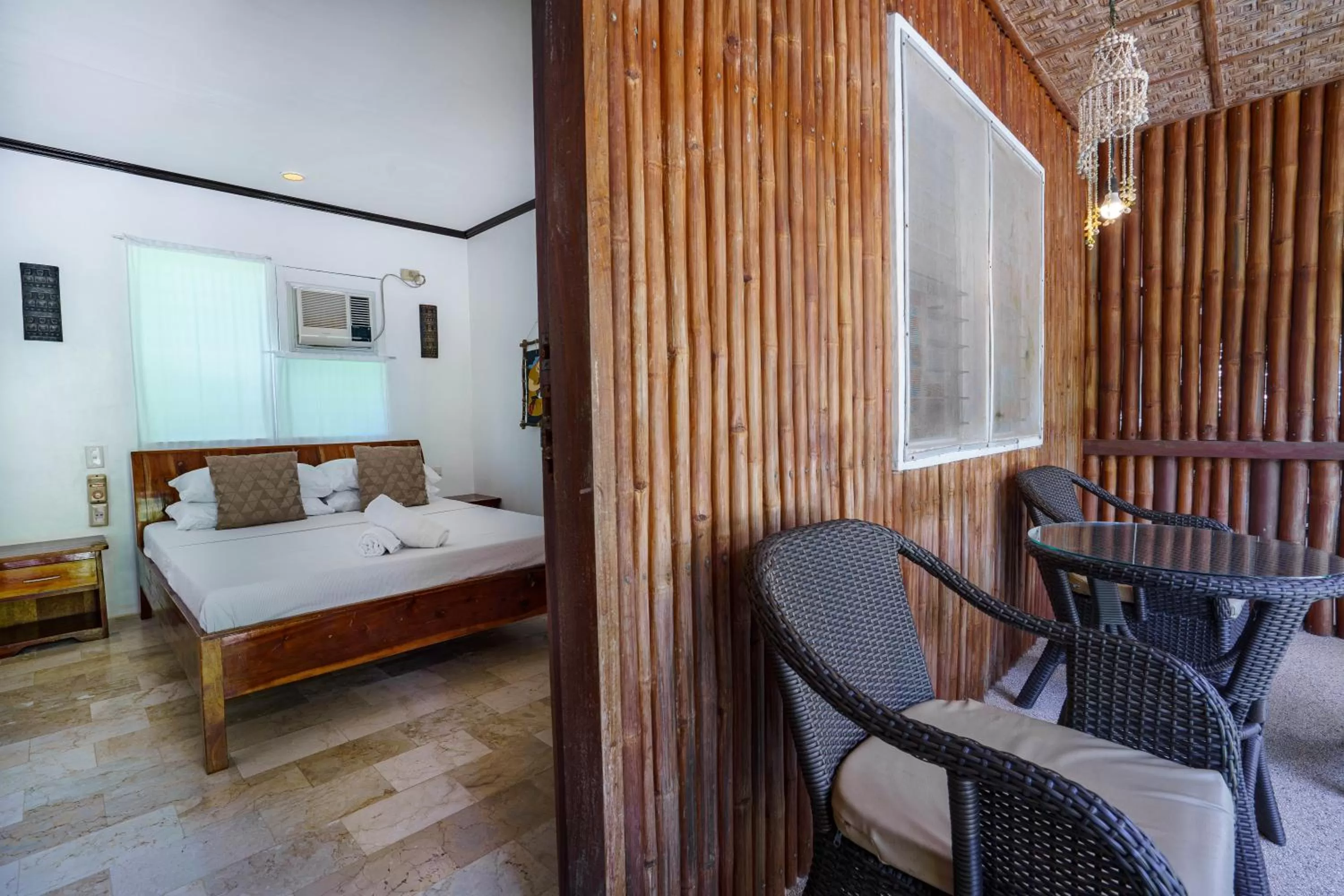 Seating area, Bed in Charisma Beach Resort