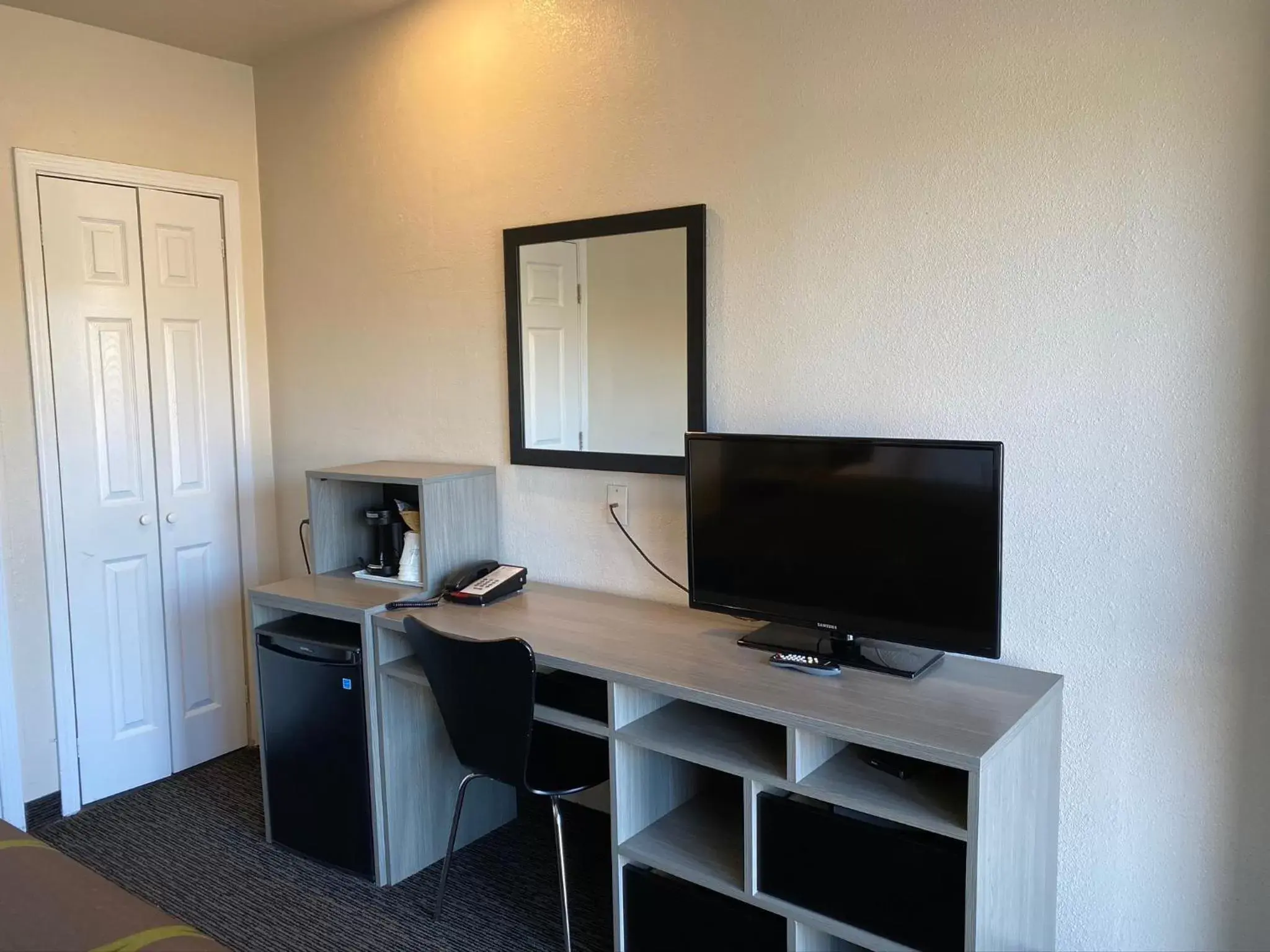 Photo of the whole room, TV/Entertainment Center in Super 8 by Wyndham Monterey