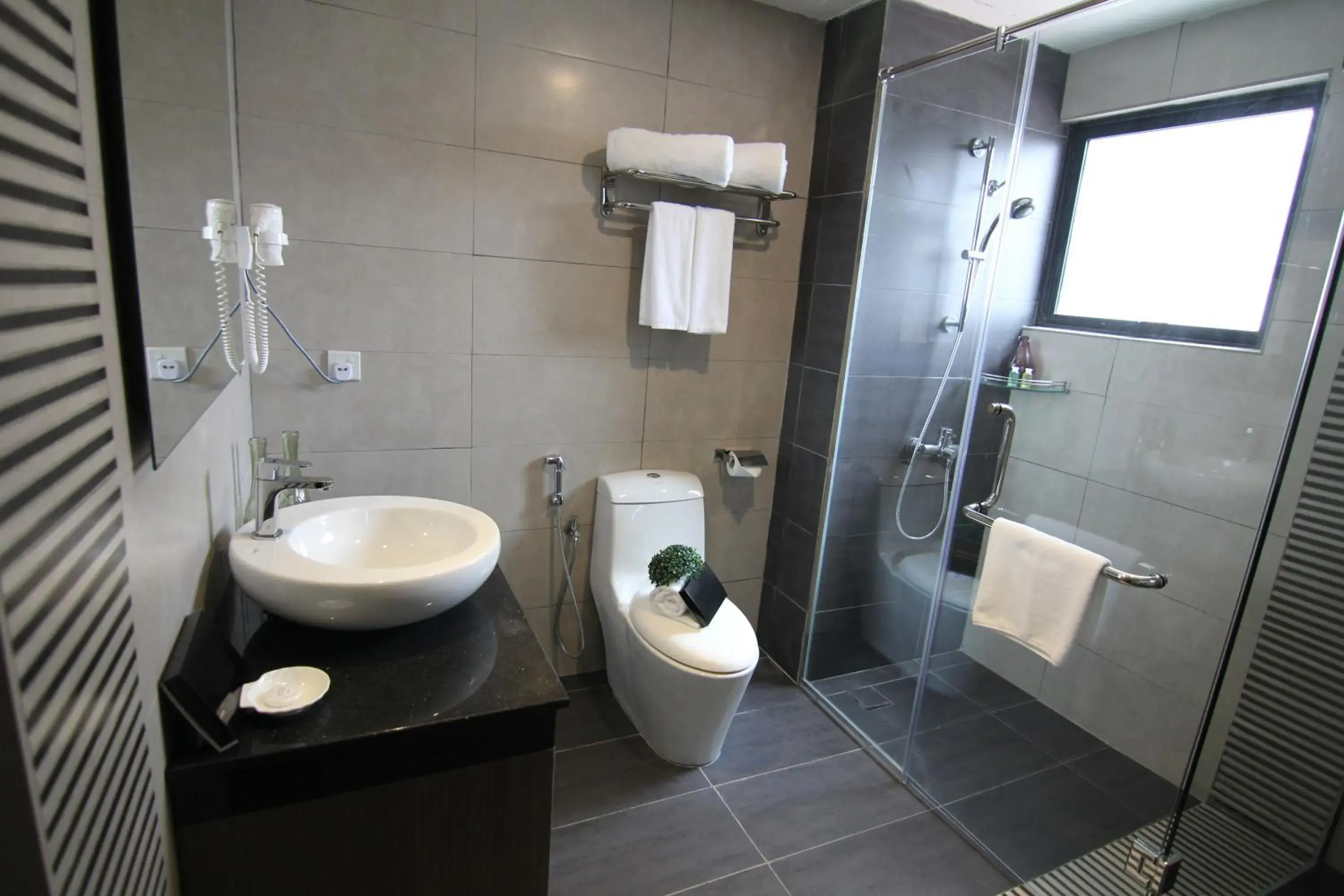 Bathroom in Nexus Business Suite Hotel