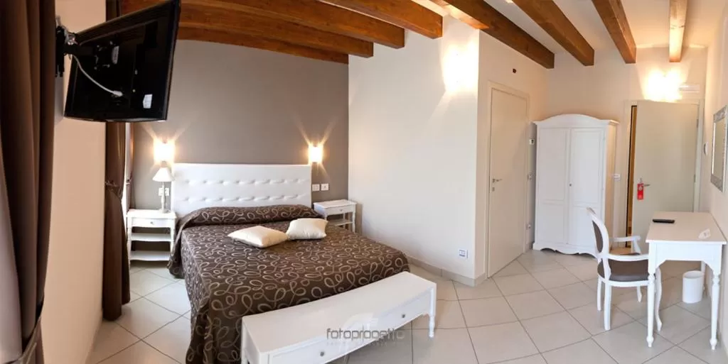 Photo of the whole room, Bed in Albergo Roma