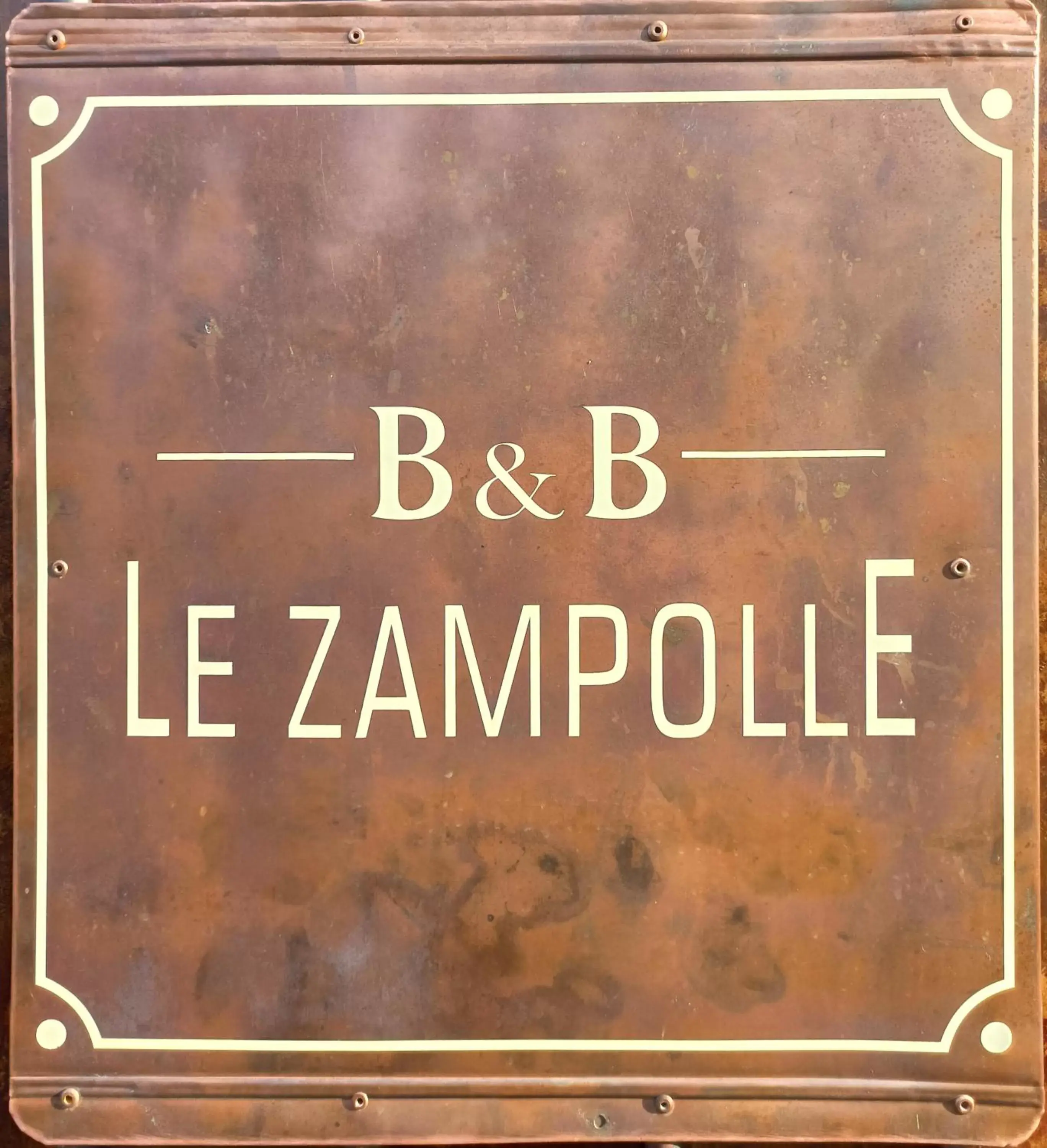 Property logo or sign in Le Zampolle B & B