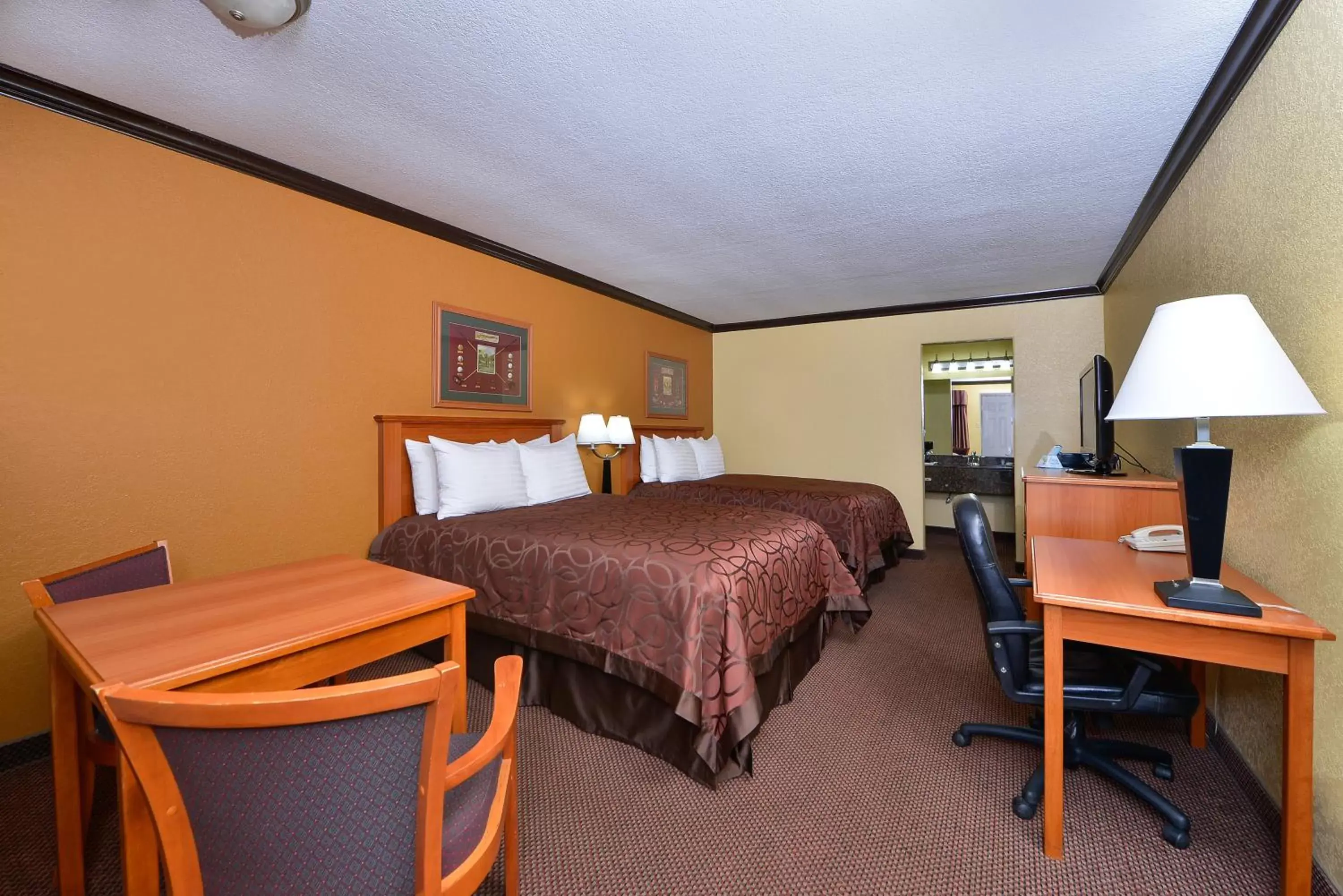 Bedroom, Bed in Americas Best Value Inn Center