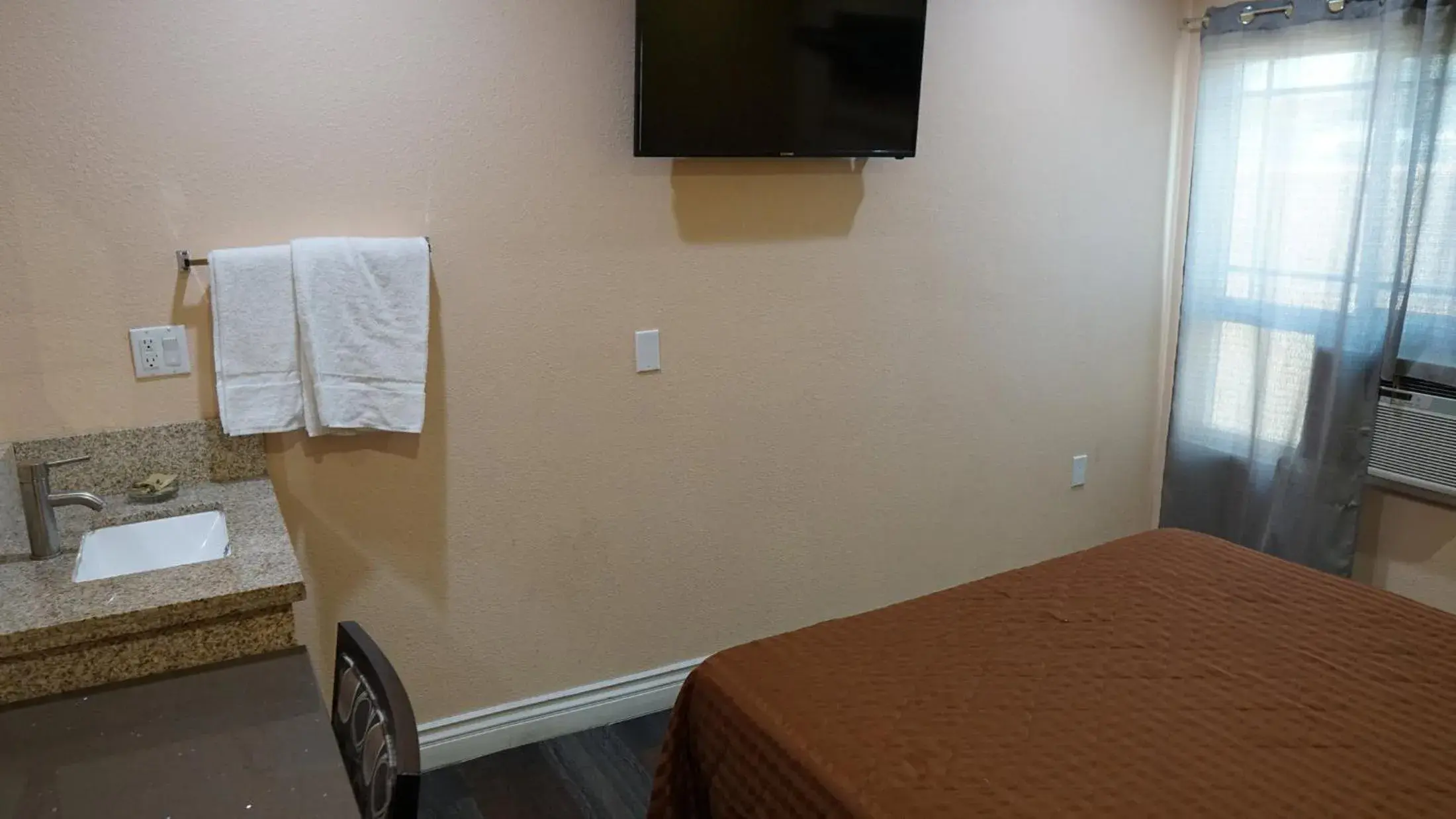 TV/Entertainment Center in Holly Crest Hotel - Los Angeles, LAX Airport