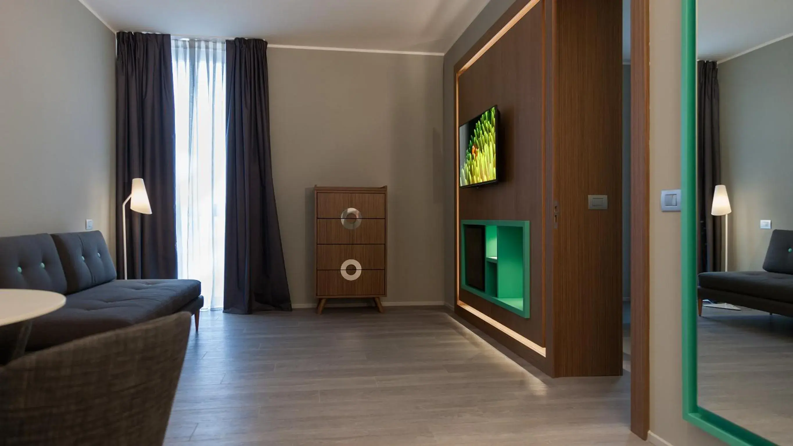 Bedroom, TV/Entertainment Center in G Hotel Pescara