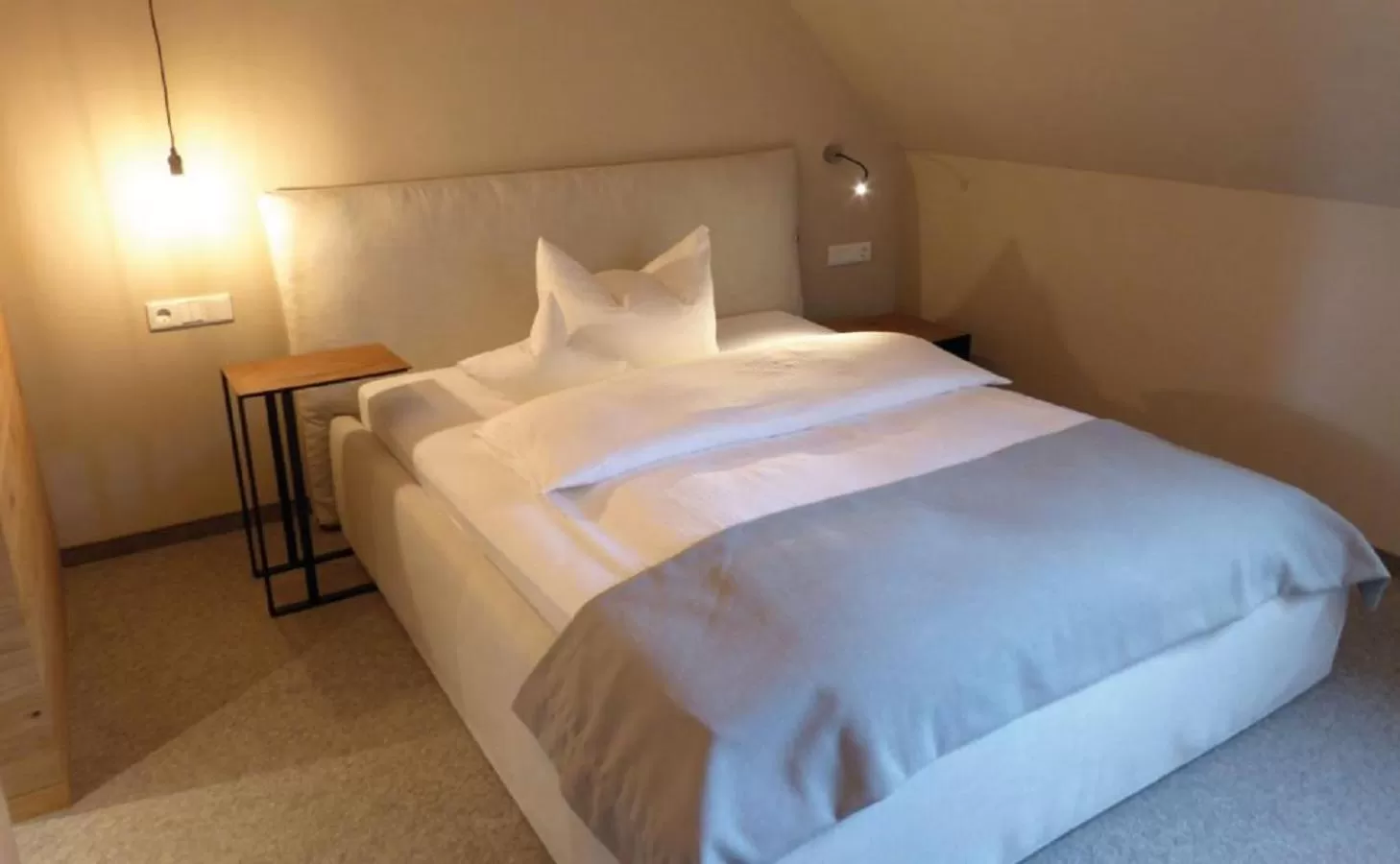 Bed in Berghotel Sammüller