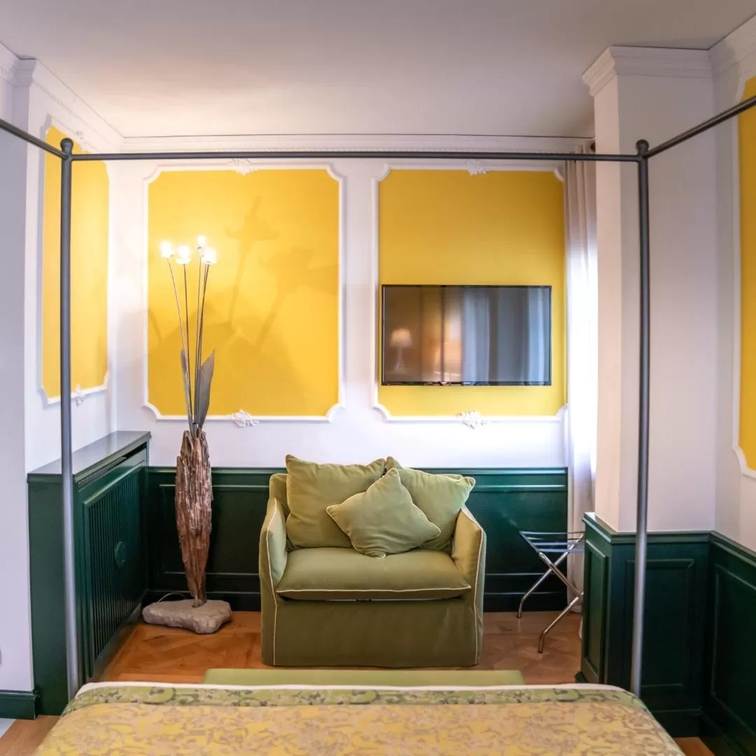 Bedroom in Ambra Cortina Luxury&Fashion Hotel