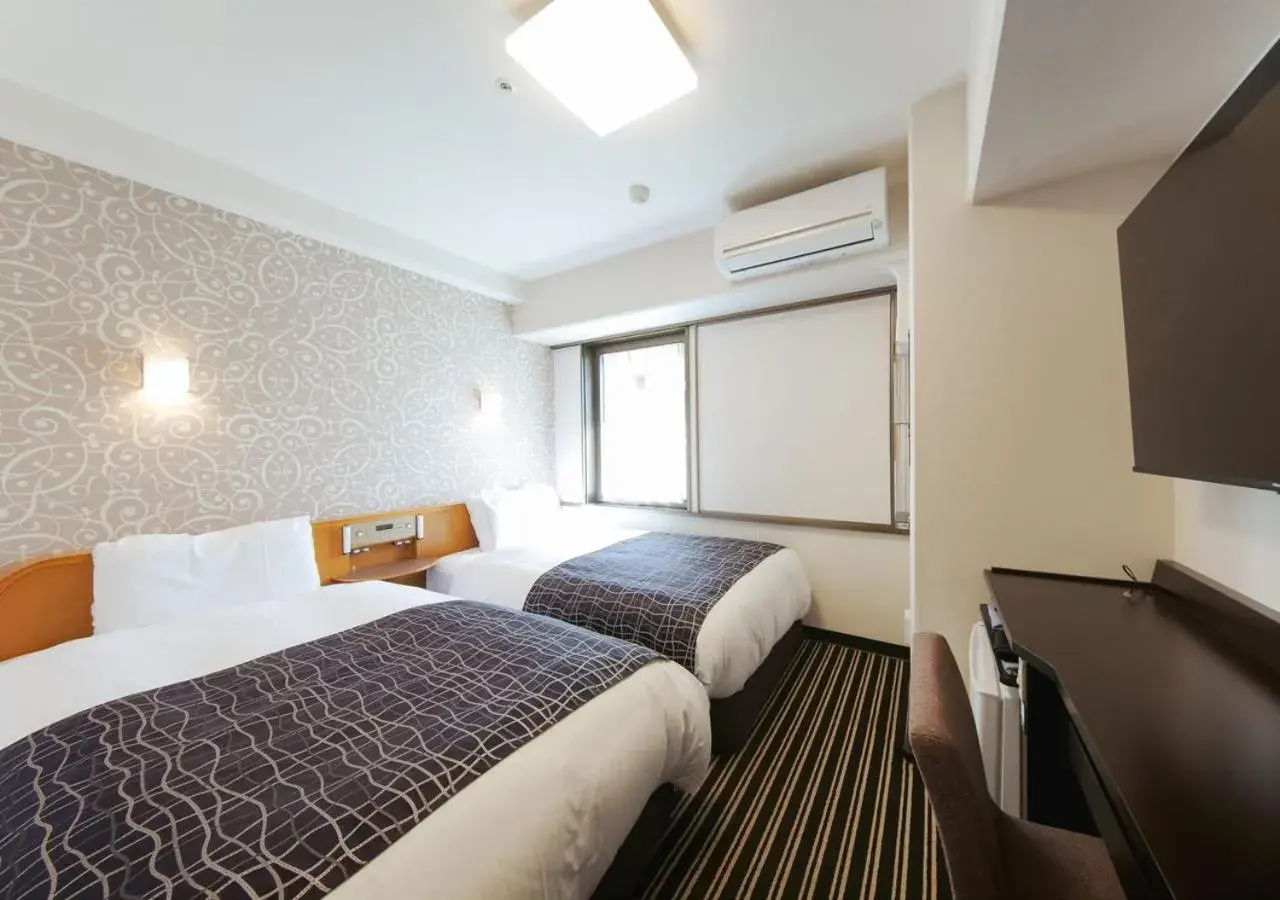 Photo of the whole room, Bed in APA Hotel Osaka-Temma