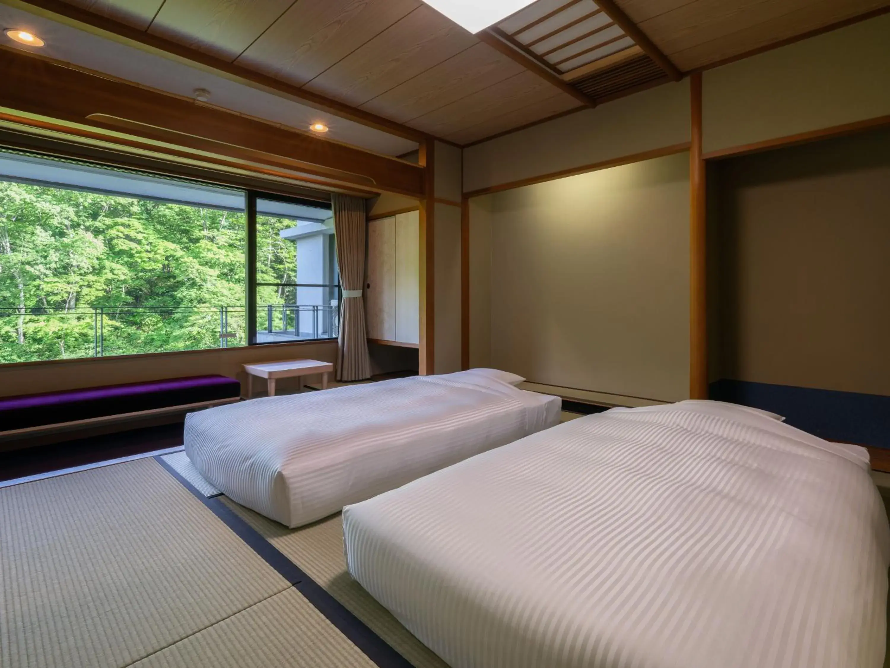 Photo of the whole room, Bed in Kamenoi Hotel Nikko Yunishigawa